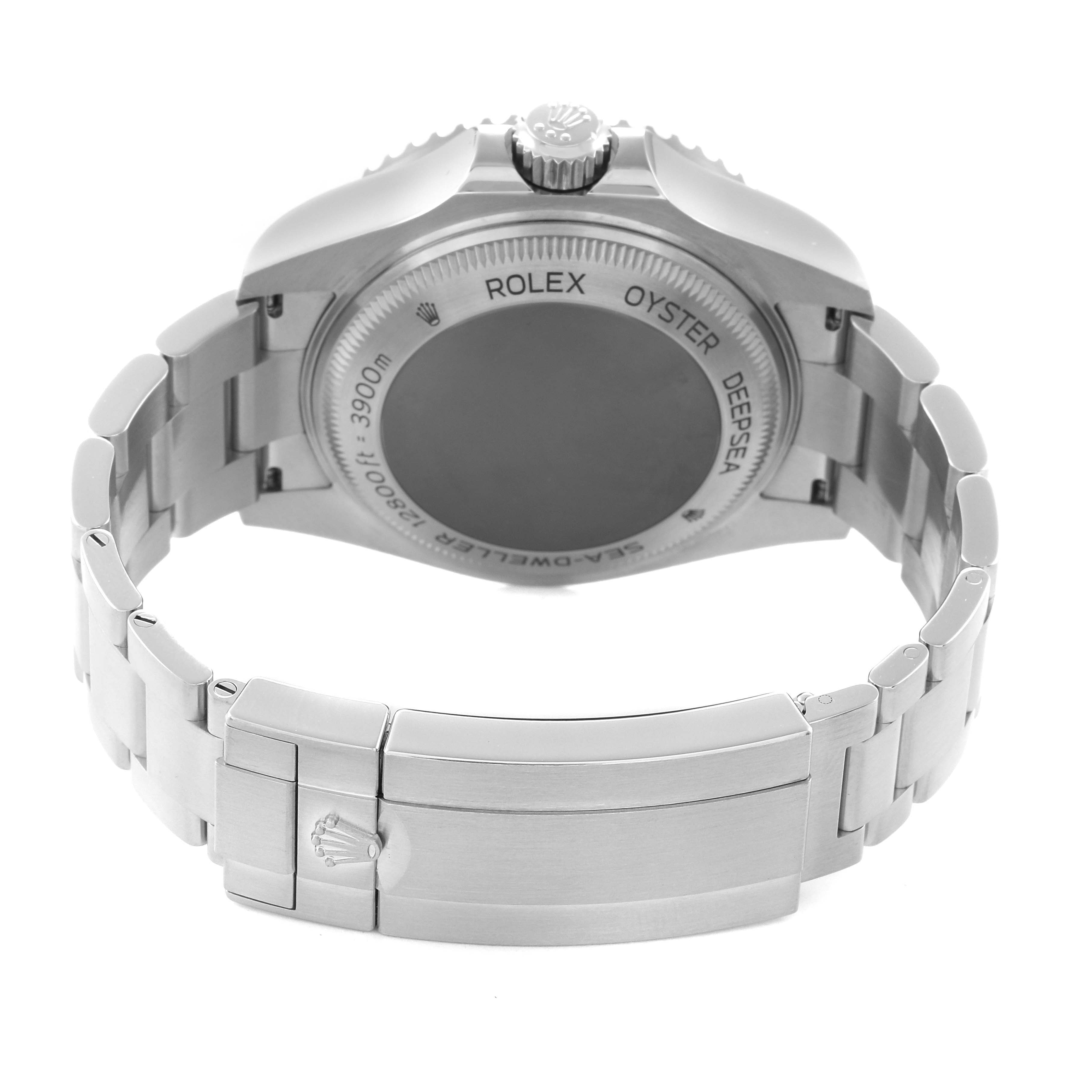 The image shows the backside of the Rolex Sea-Dweller 126660 Men
s Stainless Steel Blue Dial 126660 Men
s Stainless Steel Blue Dial, highlighting the case back, bracelet, and clasp from an angle facing the bottom.