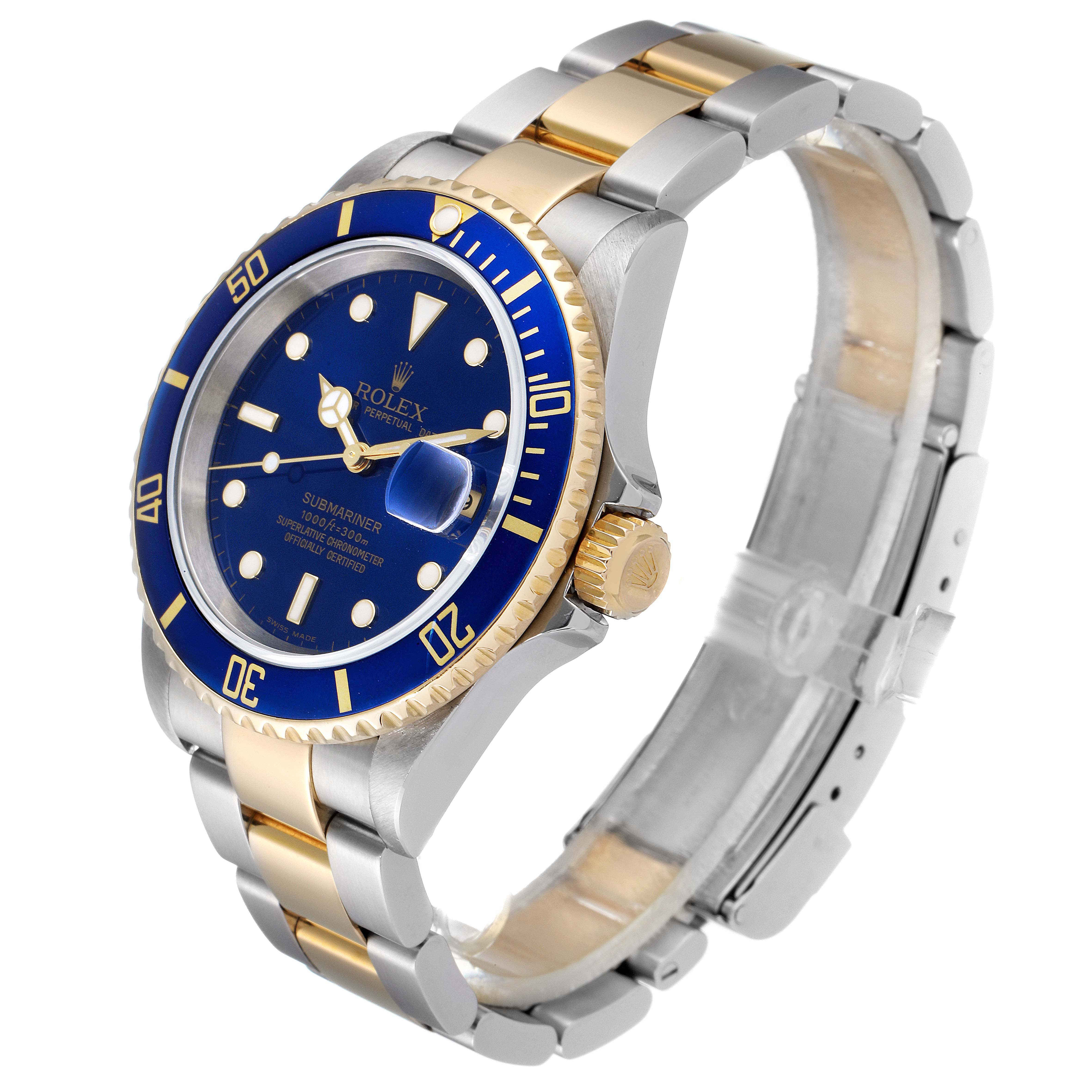 This image shows a side and top-angle view of a Rolex Submariner 16613 Men
s Steel and Gold (two tone) Blue Dial 16613 Men
s Steel and Gold (two tone) Blue Dial, highlighting the dial, bezel, crown, and bracelet.