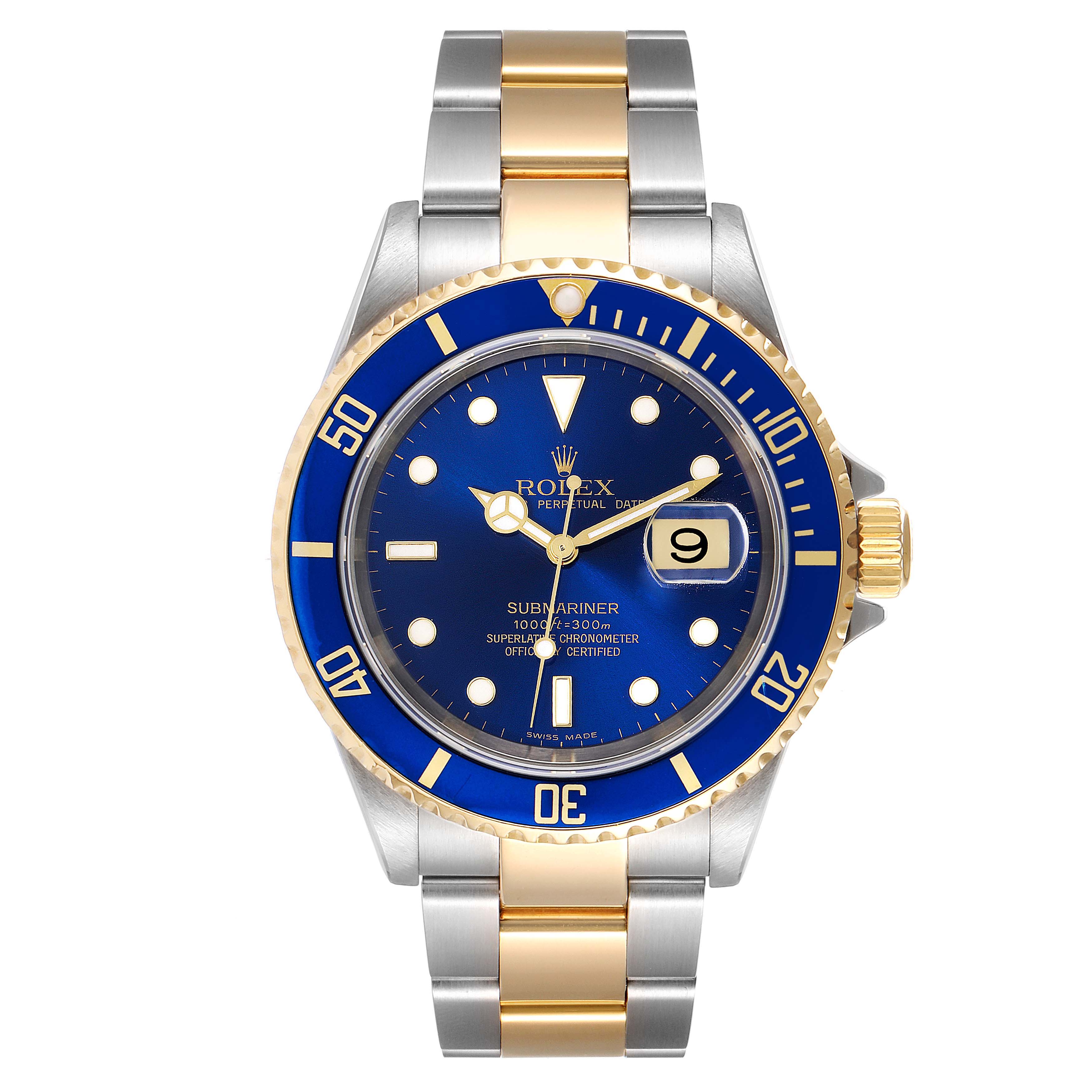 The image shows a Rolex Submariner 16613 Men
s Steel and Gold (two tone) Blue Dial 16613 Men
s Steel and Gold (two tone) Blue Dial watch with a blue dial, date window, and a two-tone stainless steel and gold bracelet from a front angle.