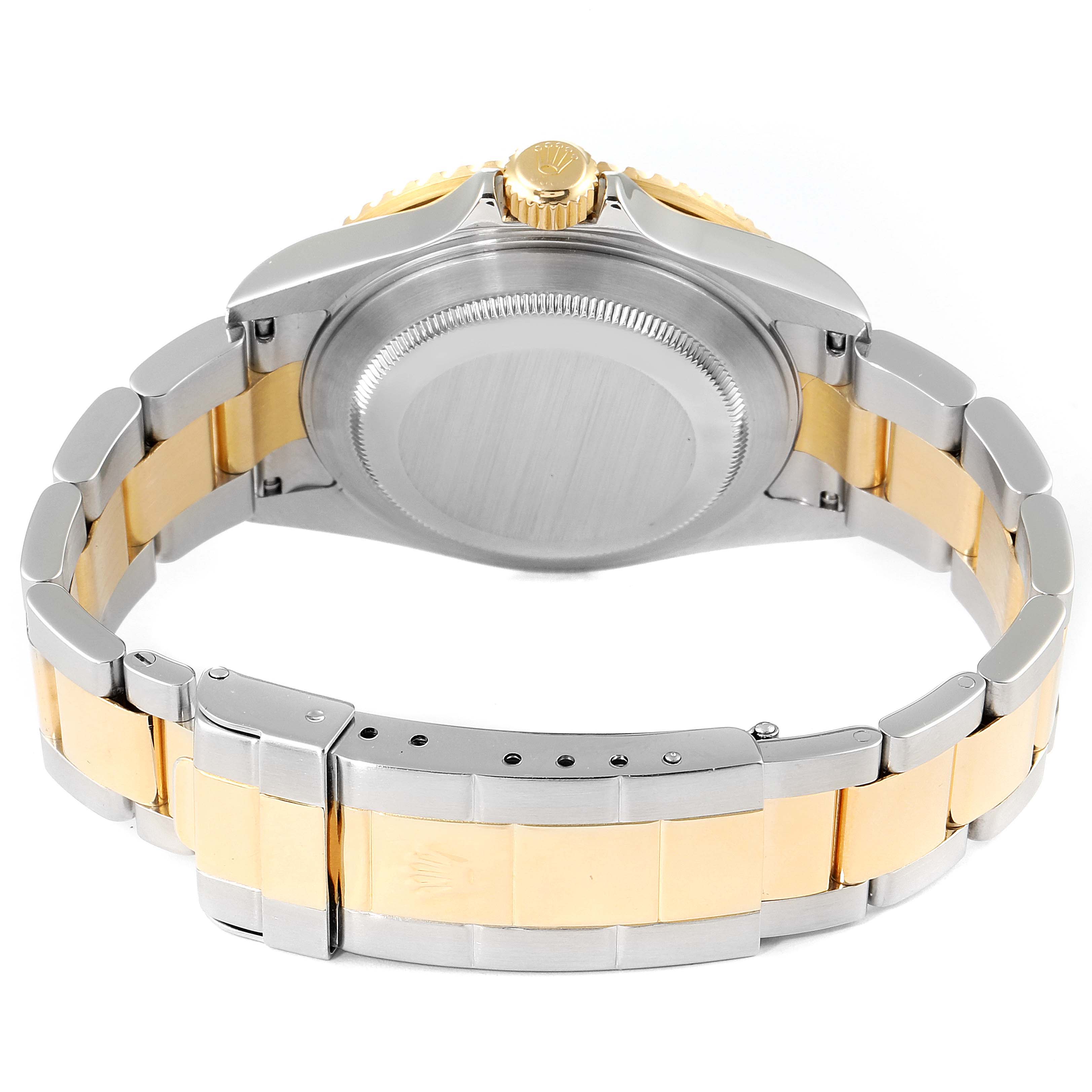 This image shows the back view of a Rolex Submariner 16613 Men
s Steel and Gold (two tone) Blue Dial 16613 Men
s Steel and Gold (two tone) Blue Dial watch, highlighting its bracelet, clasp, and case back.