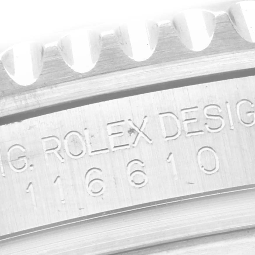 The image shows a close-up angle of the engraved side of the bezel and case on a Rolex Submariner 116610LV Men
s Stainless Steel Green Dial 116610LV Men
s Stainless Steel Green Dial.