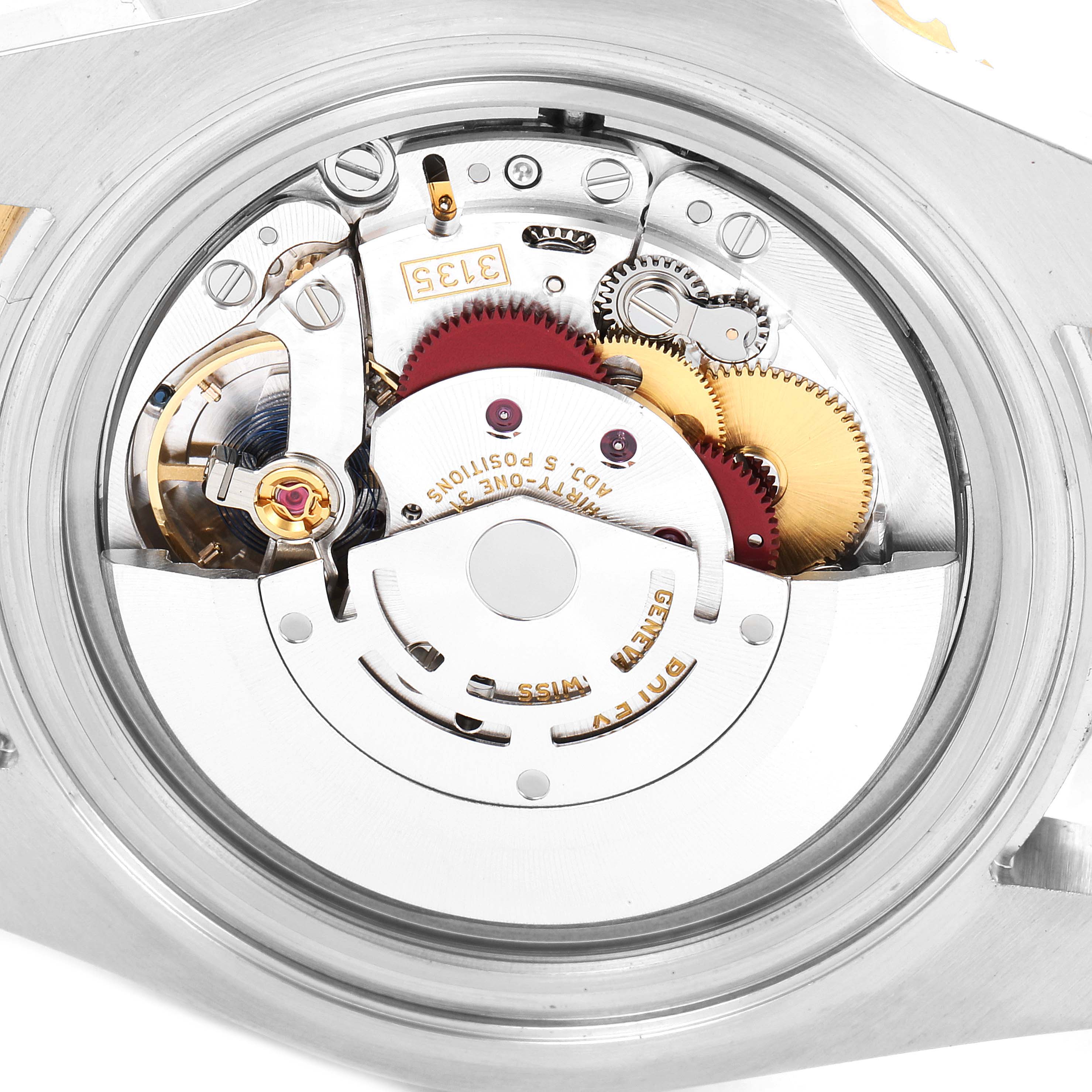 This image shows a close-up view of the inner mechanical movement of a Rolex Submariner 116613 Men
s Steel and Gold (two tone) Black Dial 116613 Men
s Steel and Gold (two tone) Black Dial watch.