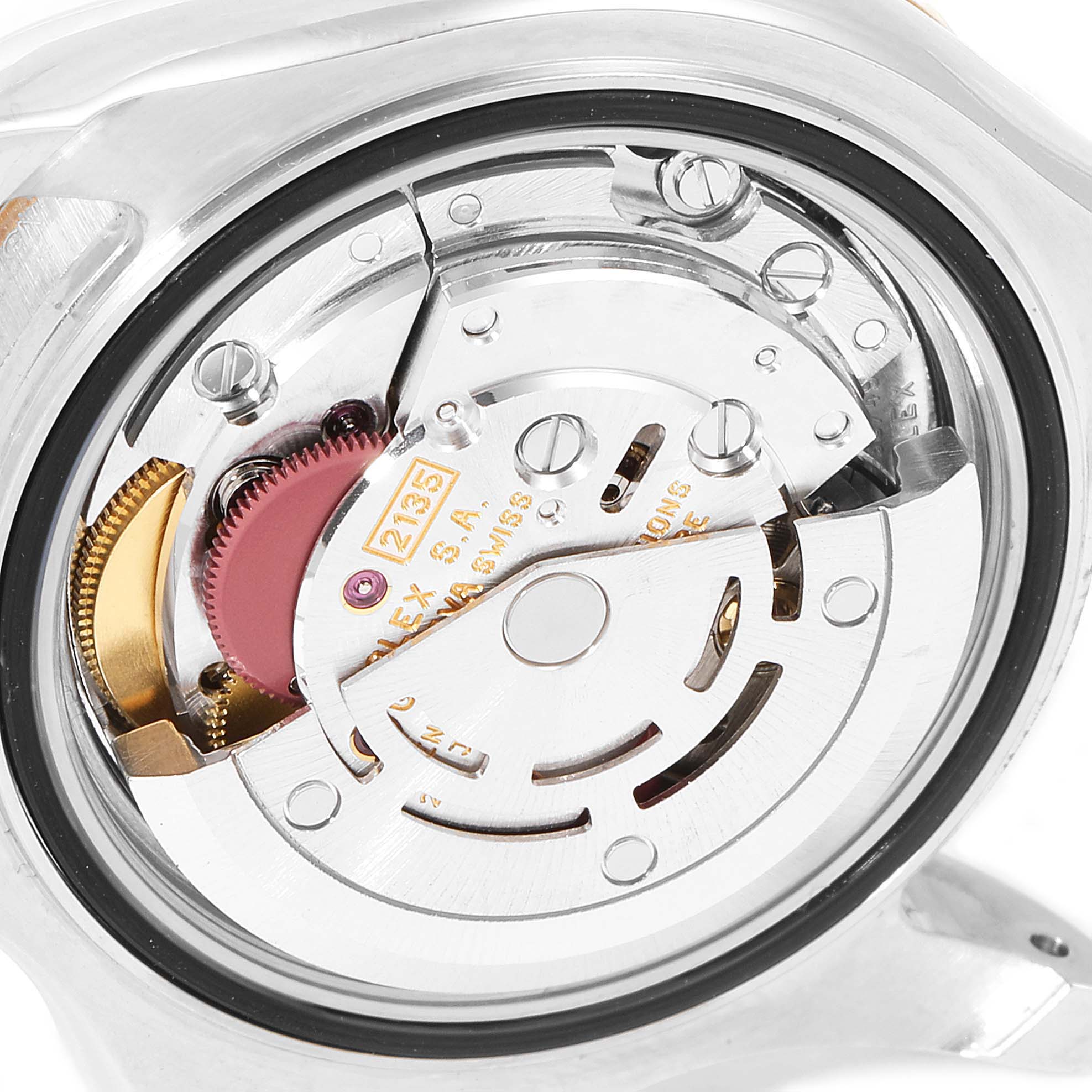 This image shows the internal mechanism of a Rolex Yacht-Master 69623 Women's Steel and Gold (two tone) Grey Dial 69623 Women's Steel and Gold (two tone) Grey Dial watch at a close-up angle, highlighting the movement components.