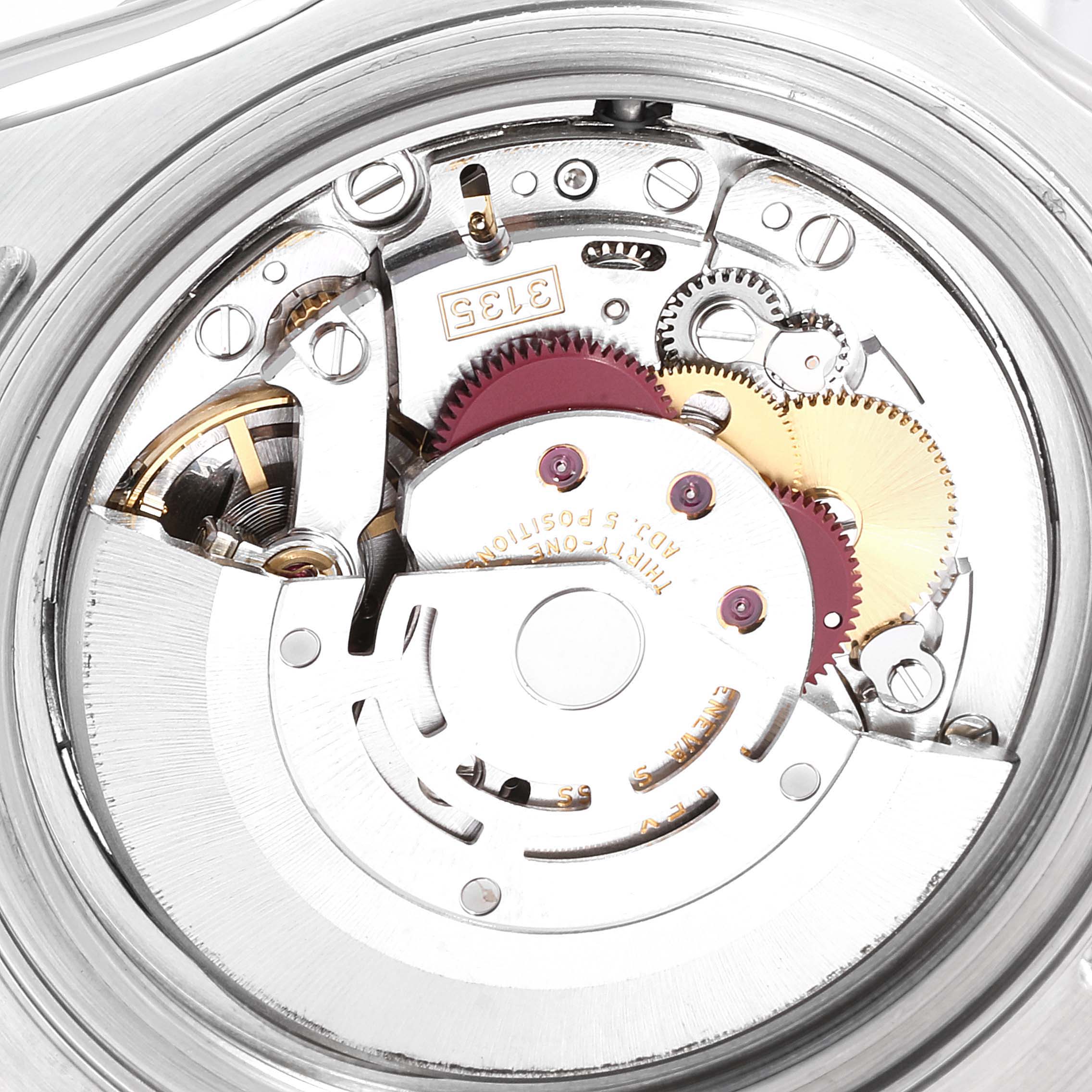 This image shows the internal mechanism of a Rolex Yacht-Master 16623  Men's Steel and Gold (two tone) Grey Dial 16623  Men's Steel and Gold (two tone) Grey Dial watch from a close-up, back angle, highlighting the gears and movement components.