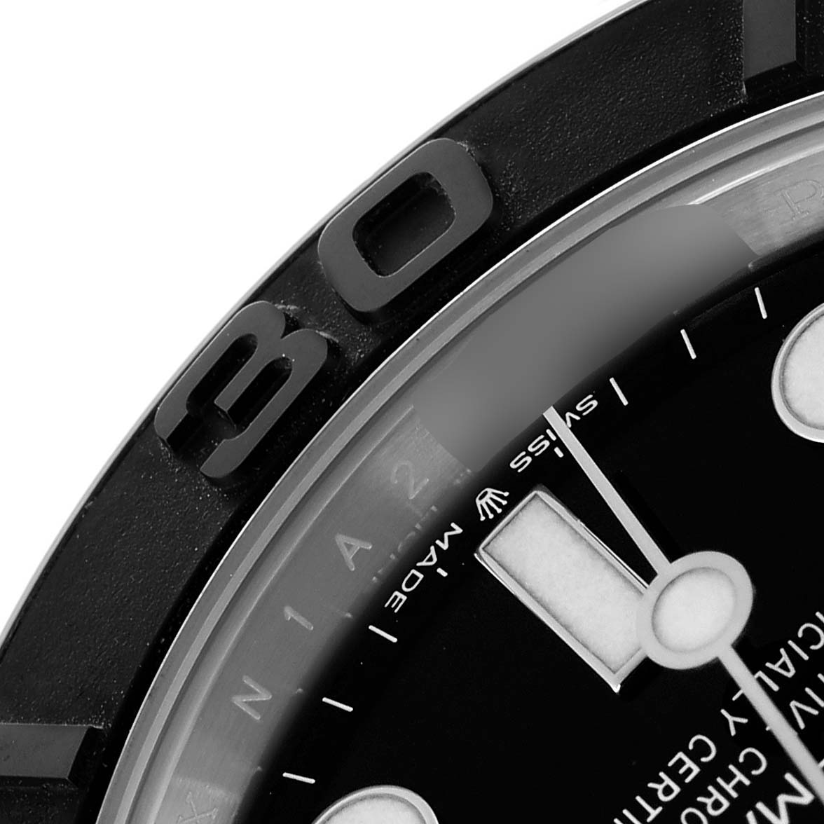 This close-up image shows the bezel and part of the dial with a marker on the Rolex Yacht-Master 226659 Men's White Gold Black Dial 226659 Men's White Gold Black Dial watch.
