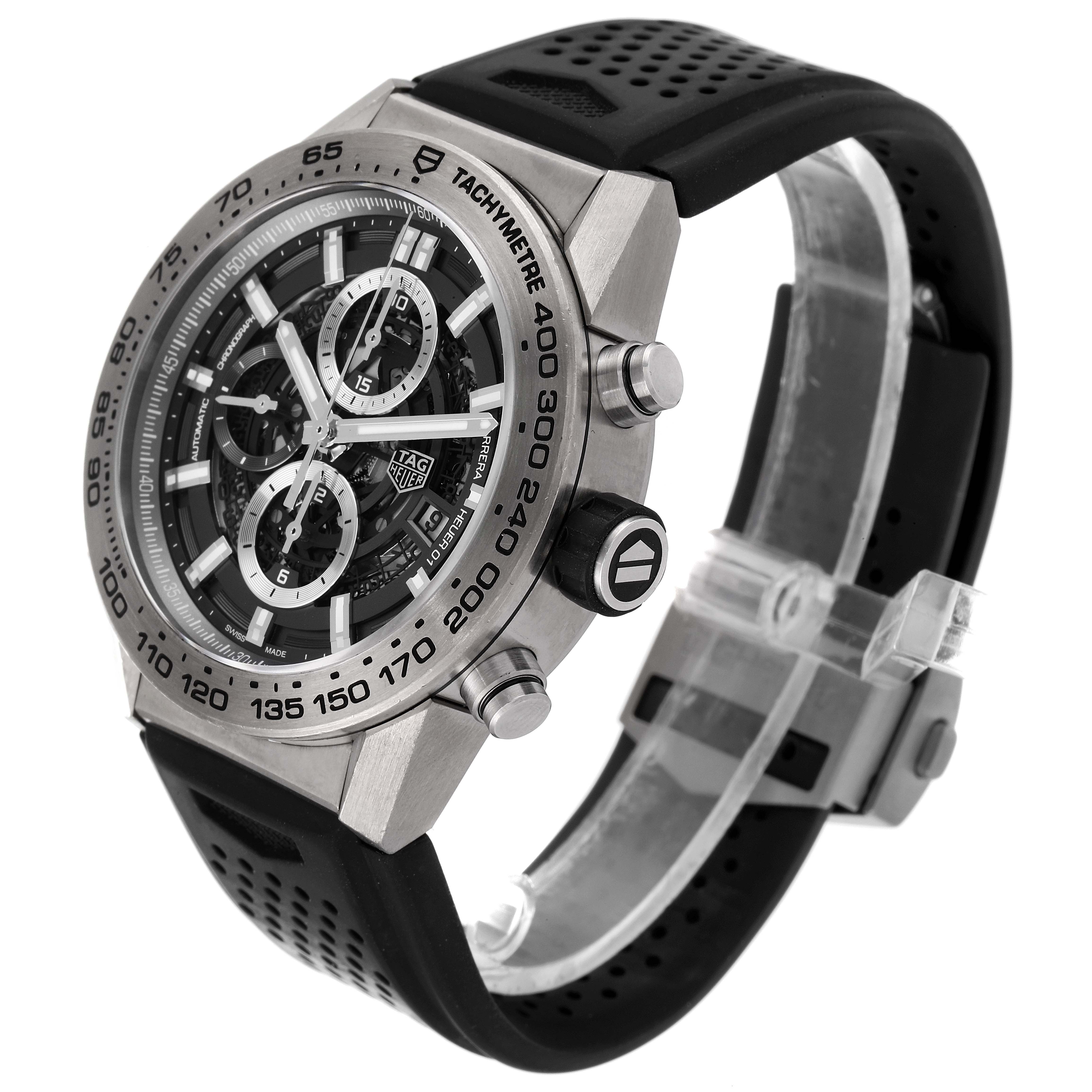 This image shows the Tag Heuer Carrera CAR2A8A.FT6072 Men's Titanium Grey Dial CAR2A8A.FT6072 Men's Titanium Grey Dial watch in a three-quarter view, highlighting the dial, bezel, push buttons, and black perforated strap.