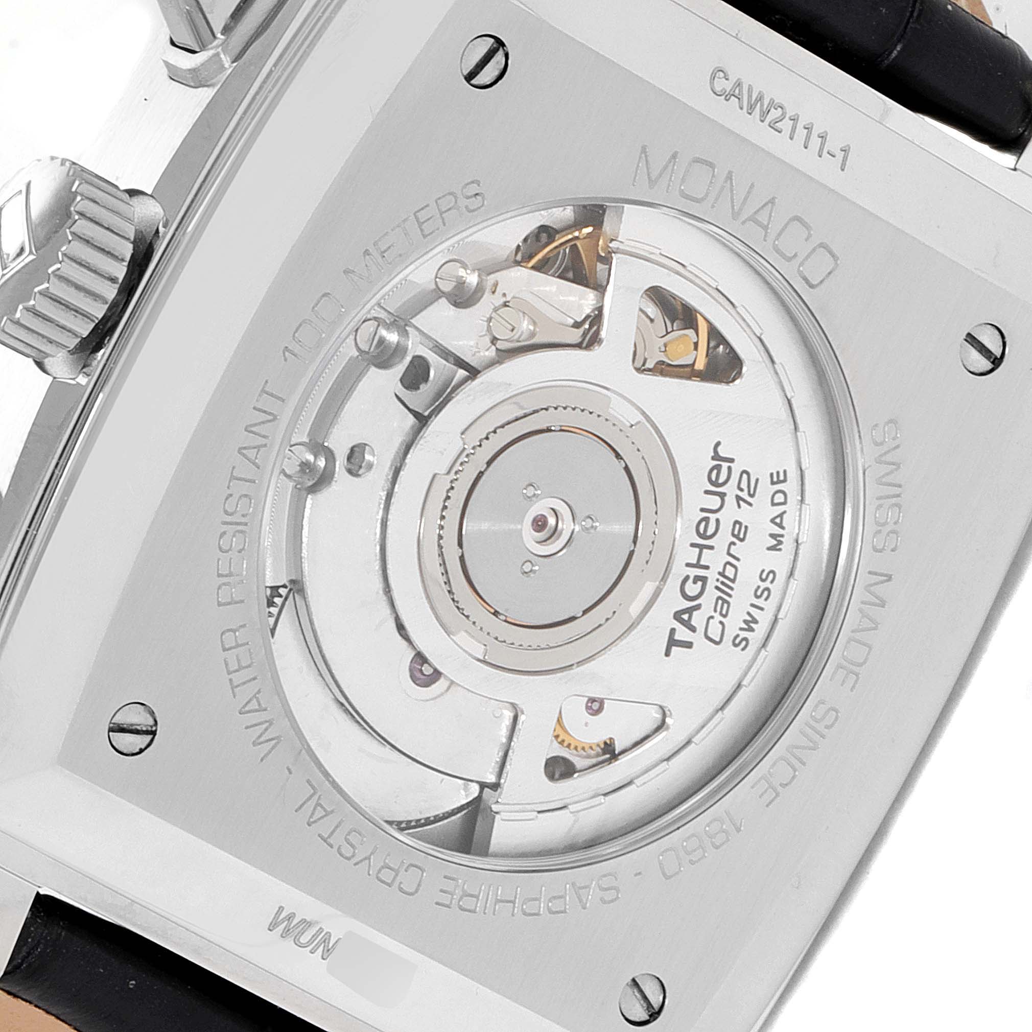 The image shows the back view of the Tag Heuer Monaco CAW2111 Men's Stainless Steel Blue Dial CAW2111 Men's Stainless Steel Blue Dial watch, revealing its Calibre 72 movement and Swiss Made inscription.