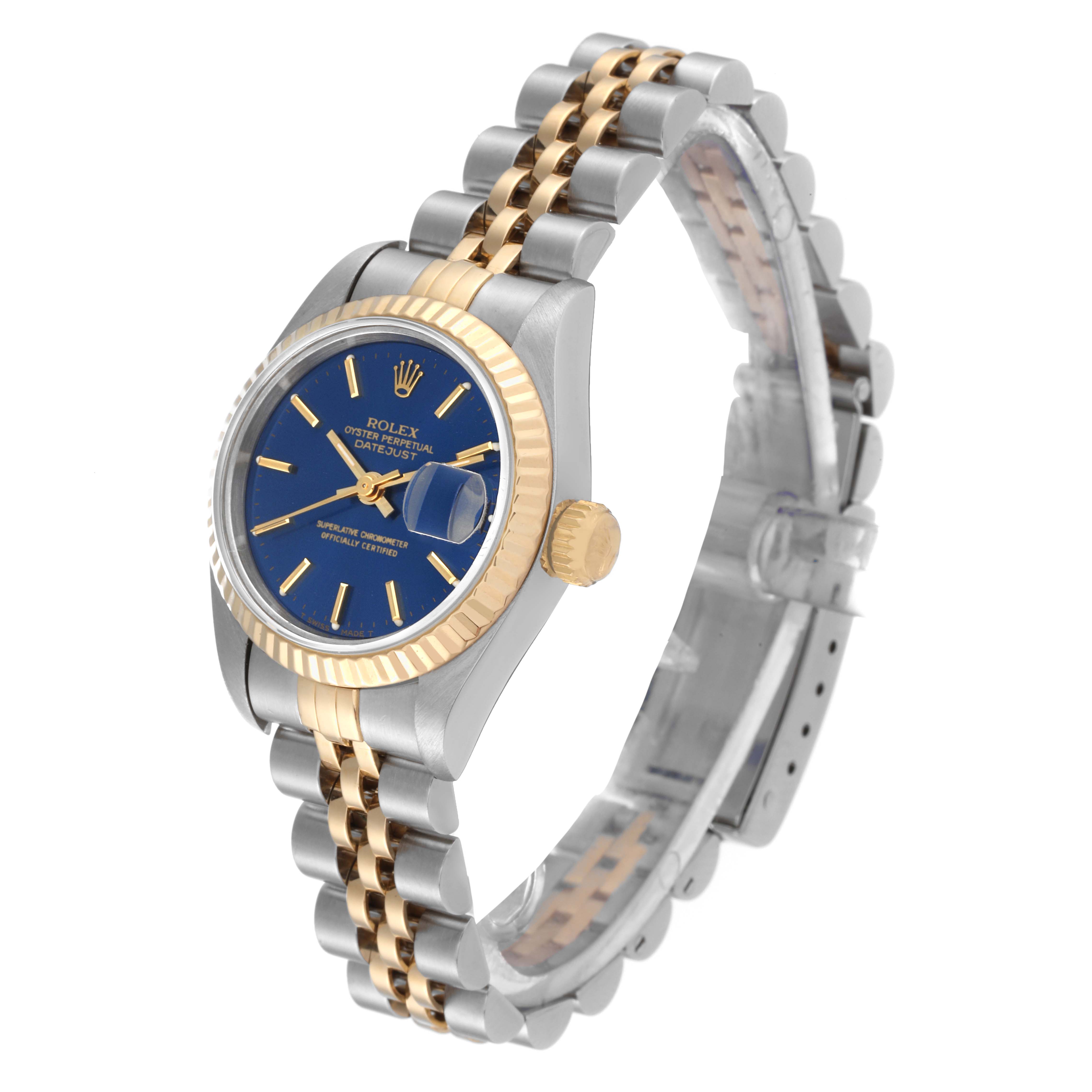 This image shows a Rolex Datejust 69173 Women's Steel and Gold (two tone) Blue Dial 69173 Women's Steel and Gold (two tone) Blue Dial watch at a three-quarter angle, highlighting its dial, bezel, crown, and two-tone bracelet.