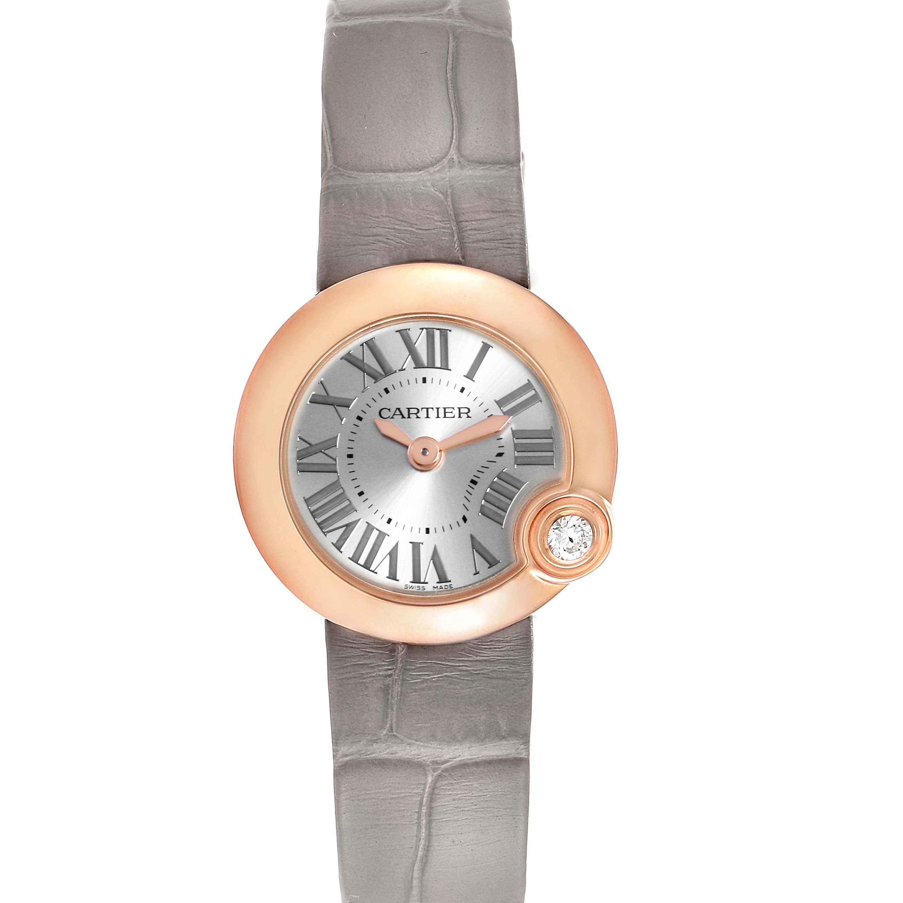 This image shows a frontal view of a Cartier Ballon Bleu watch with a grey leather strap and a round, rose-gold bezel.