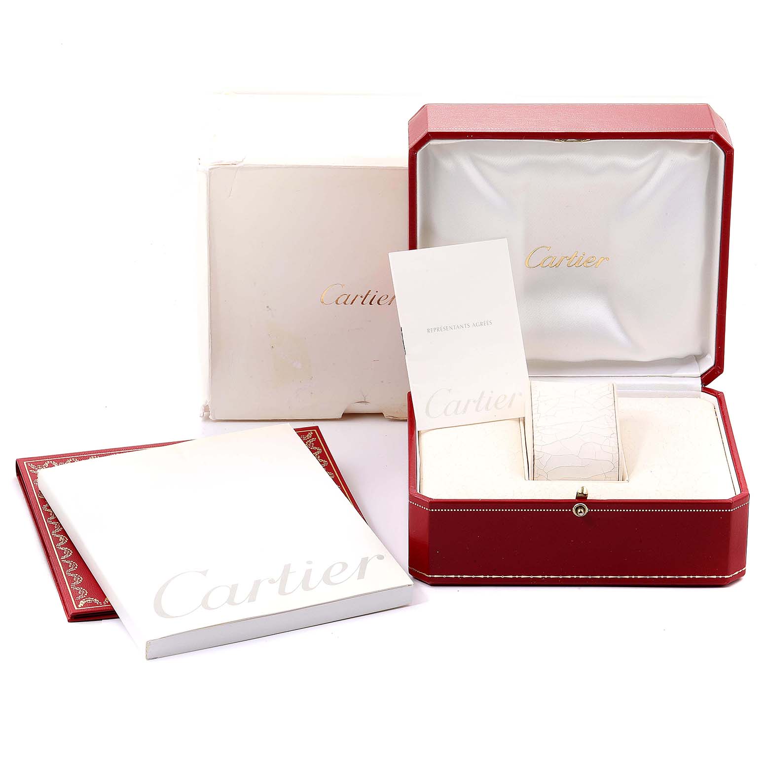 This image shows the packaging and accessories for a Cartier Pasha W31058M7 Women's Stainless Steel Pink Dial W31058M7 Women's Stainless Steel Pink Dial model watch, including the box, warranty card, and booklet.