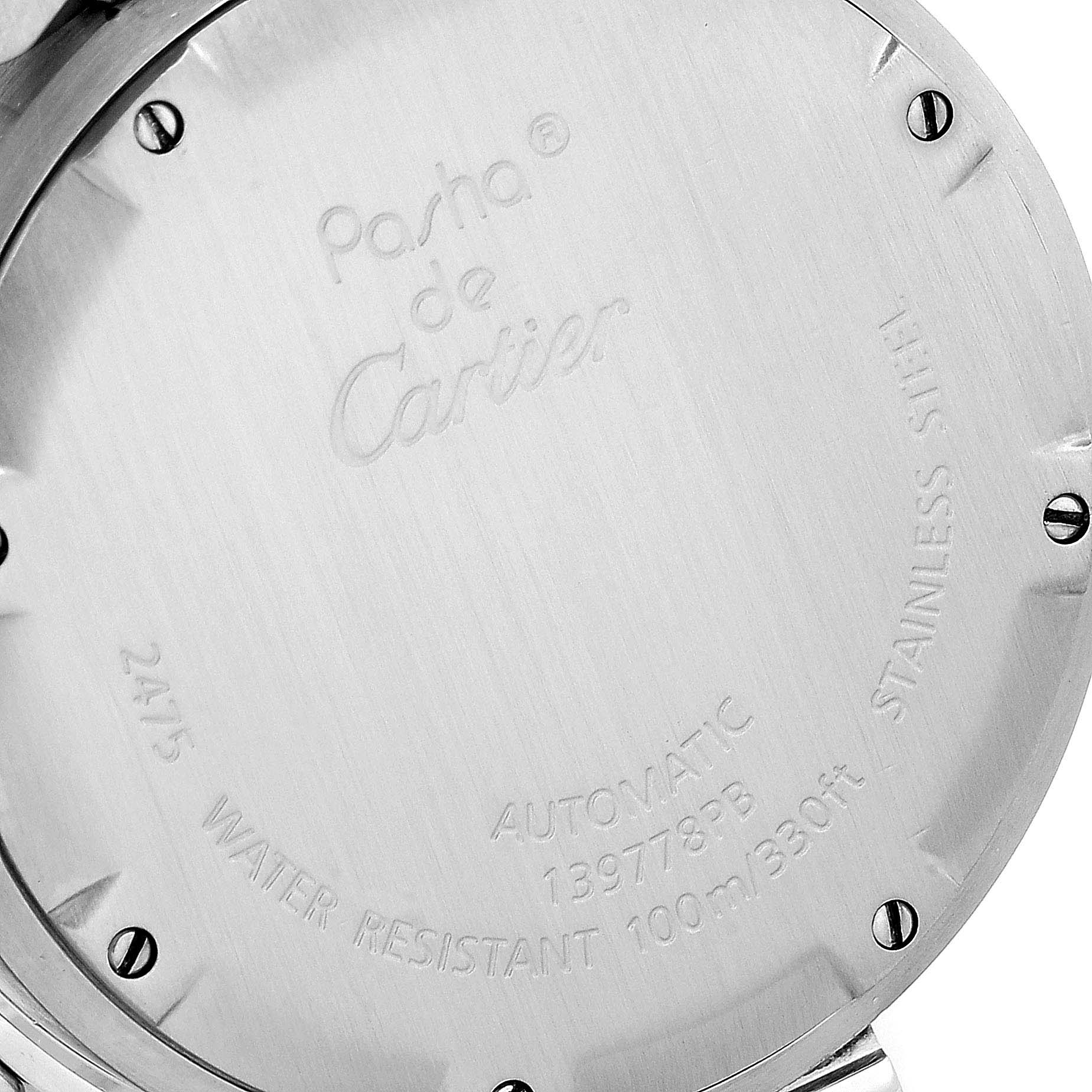 The image shows the back case of a Cartier Pasha W31058M7 Women's Stainless Steel Pink Dial W31058M7 Women's Stainless Steel Pink Dial watch at a close-up angle.