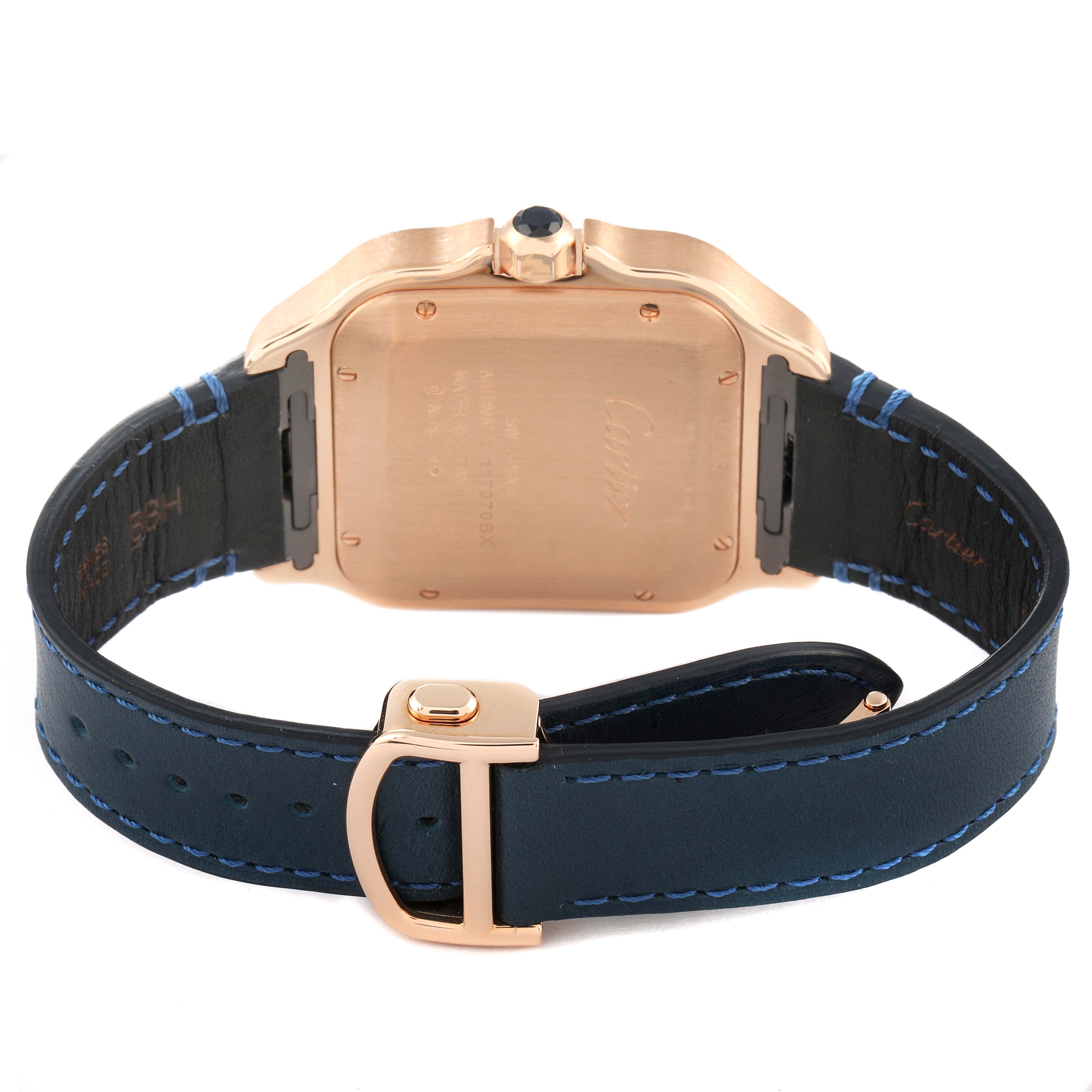 The image shows the back view of a Cartier Santos WGSA0011 Men's Rose Gold Silver Dial WGSA0011 Men's Rose Gold Silver Dial watch, highlighting the caseback, crown, and leather strap with deployment clasp.