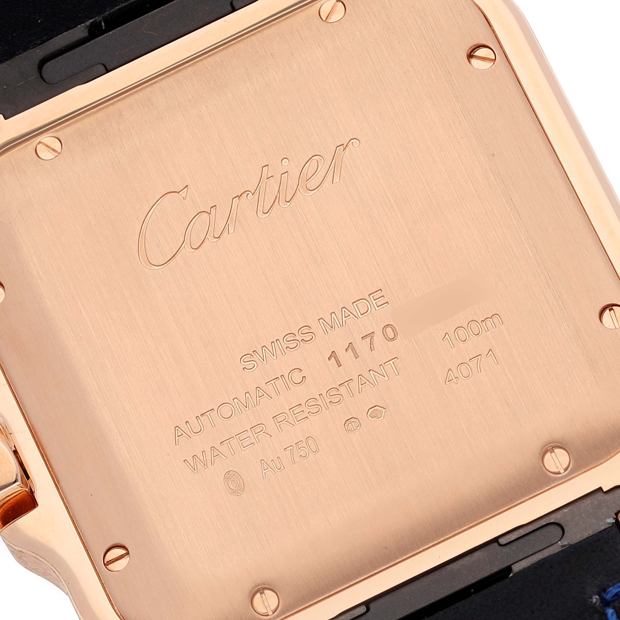 This image shows the back case of a Cartier Santos WGSA0011 Men's Rose Gold Silver Dial WGSA0011 Men's Rose Gold Silver Dial watch, highlighting engravings and screws.