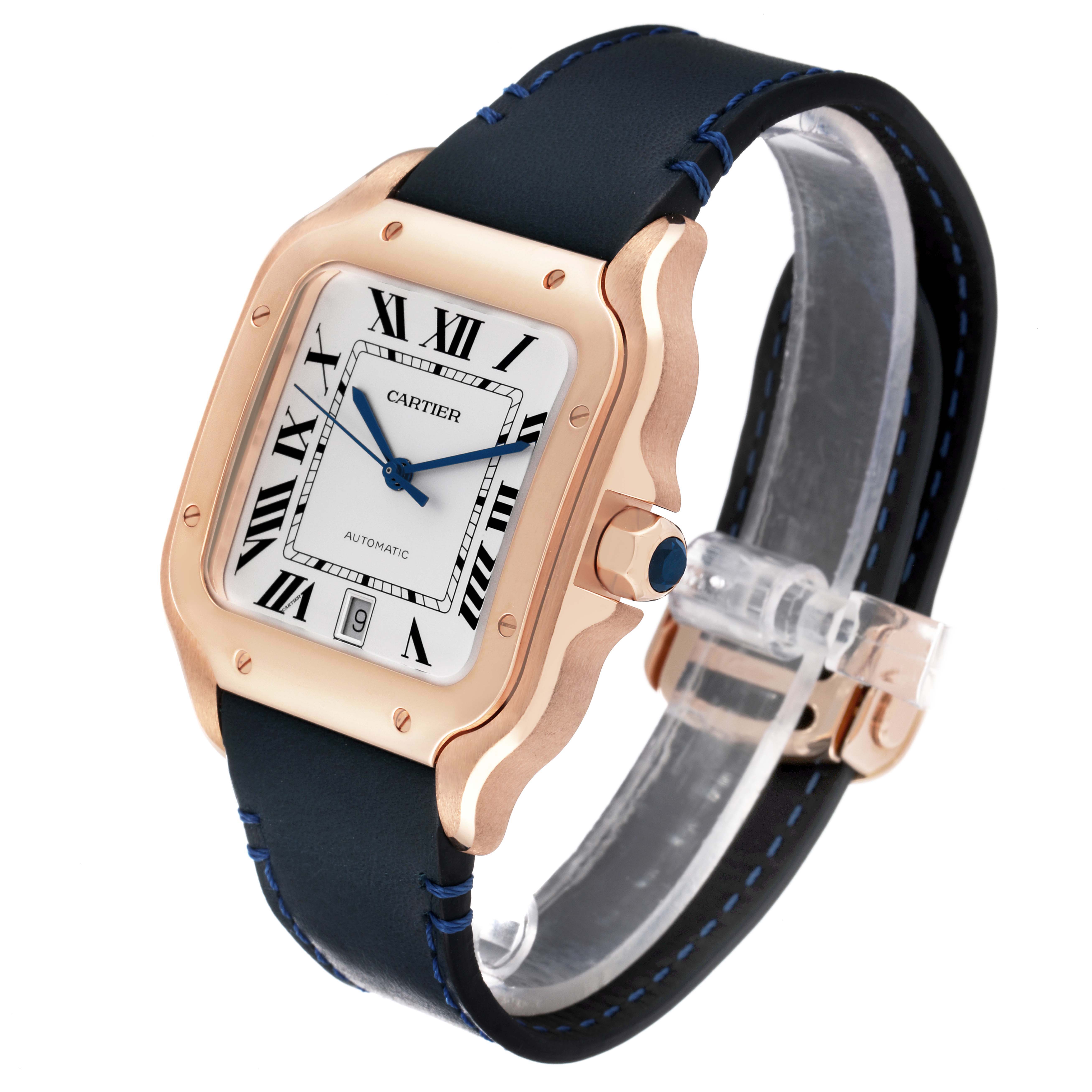 The Cartier Santos WGSA0011 Men's Rose Gold Silver Dial WGSA0011 Men's Rose Gold Silver Dial watch is shown at a three-quarter angle, highlighting the face, case, crown, and strap with buckle closure.