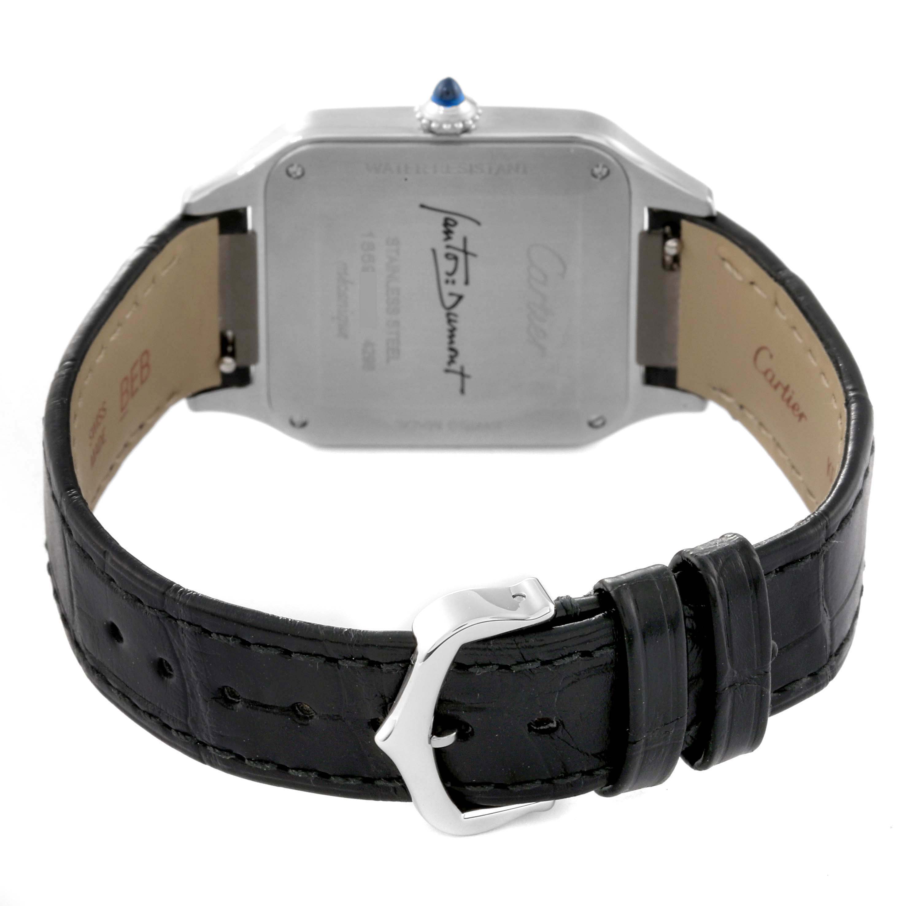 The image shows a rear view of the Cartier Santos Dumont WSSA0046 Men's Stainless Steel Black Dial WSSA0046 Men's Stainless Steel Black Dial watch, highlighting the back case and black leather strap with a buckle.
