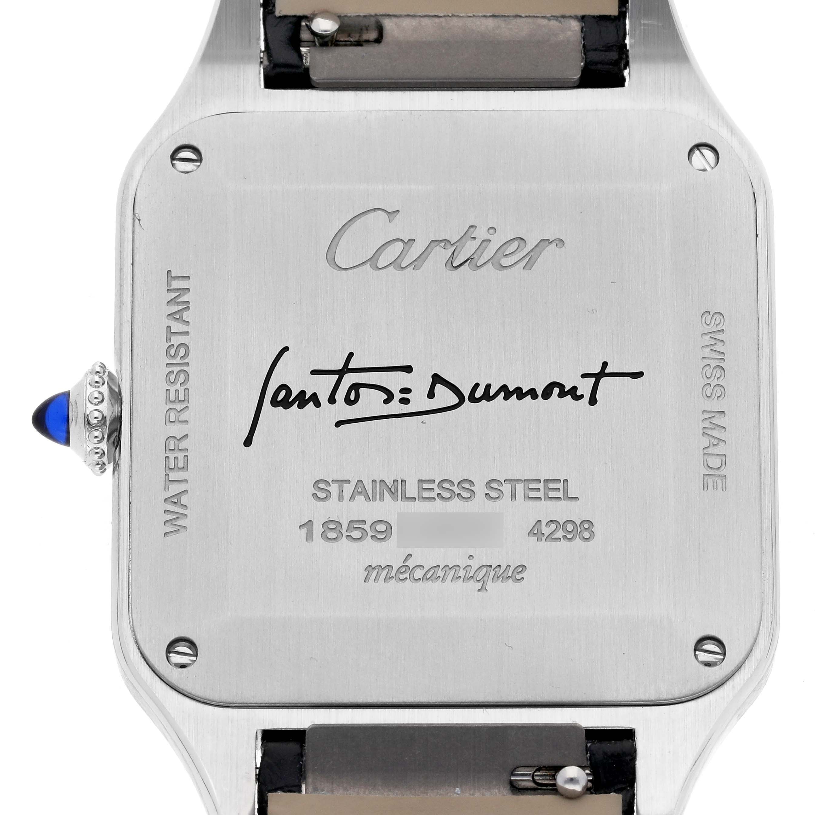 This image shows the stainless steel back case and crown of a Cartier Santos Dumont WSSA0046 Men's Stainless Steel Black Dial WSSA0046 Men's Stainless Steel Black Dial watch.