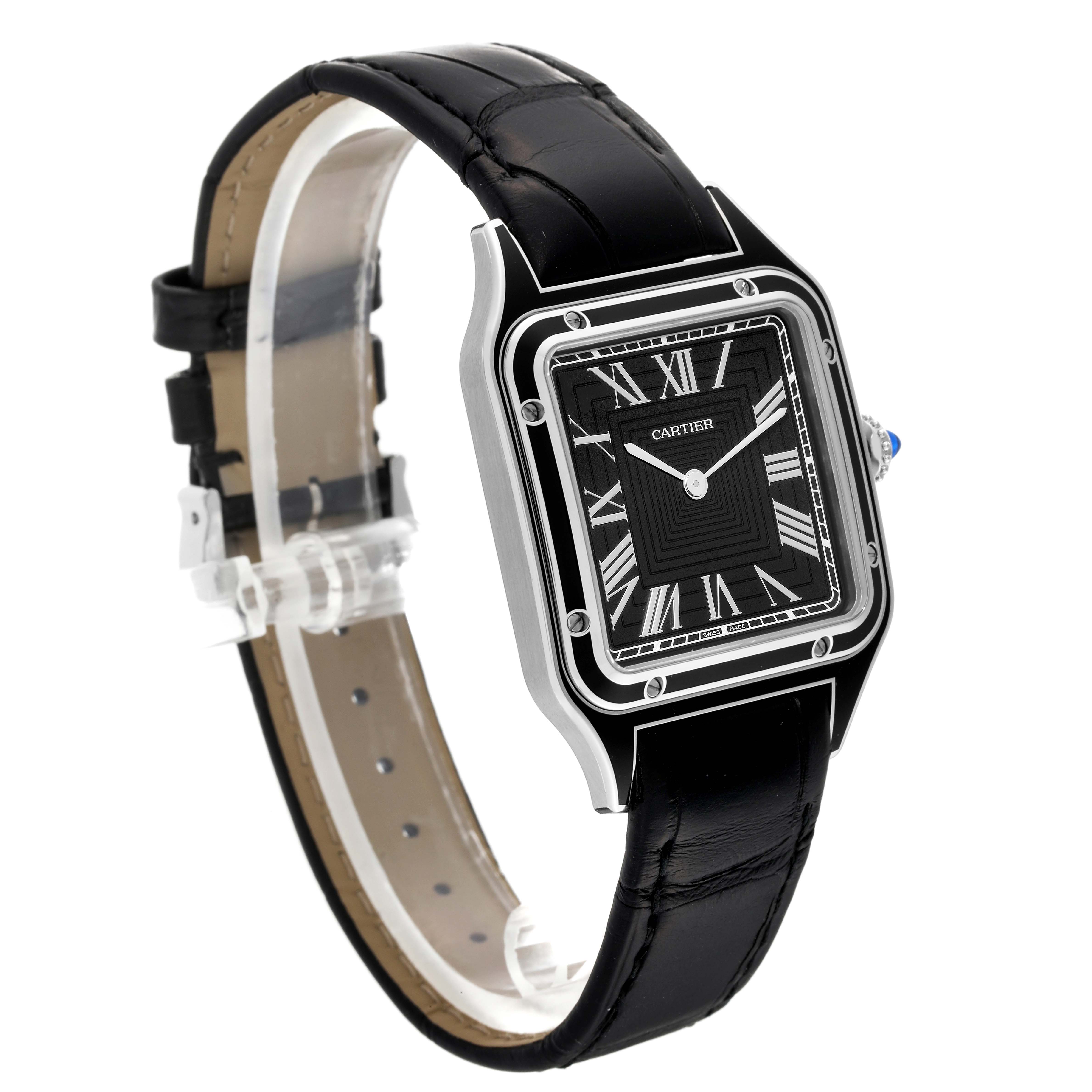 The image shows the Cartier Santos Dumont WSSA0046 Men's Stainless Steel Black Dial WSSA0046 Men's Stainless Steel Black Dial watch at a three-quarter angle, displaying its black dial, Roman numerals, and black leather strap.