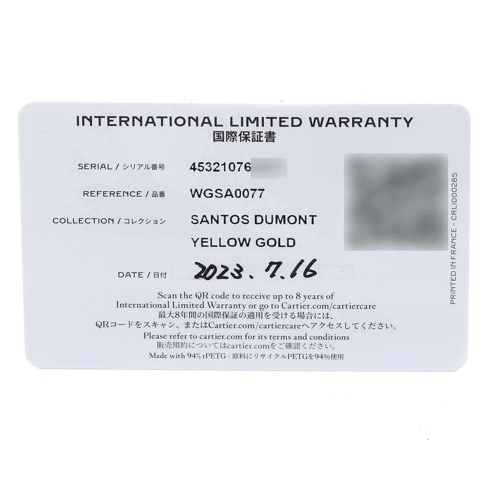 The image shows an International Limited Warranty card for the Santos Dumont model by Cartier, specifying it is in yellow gold.