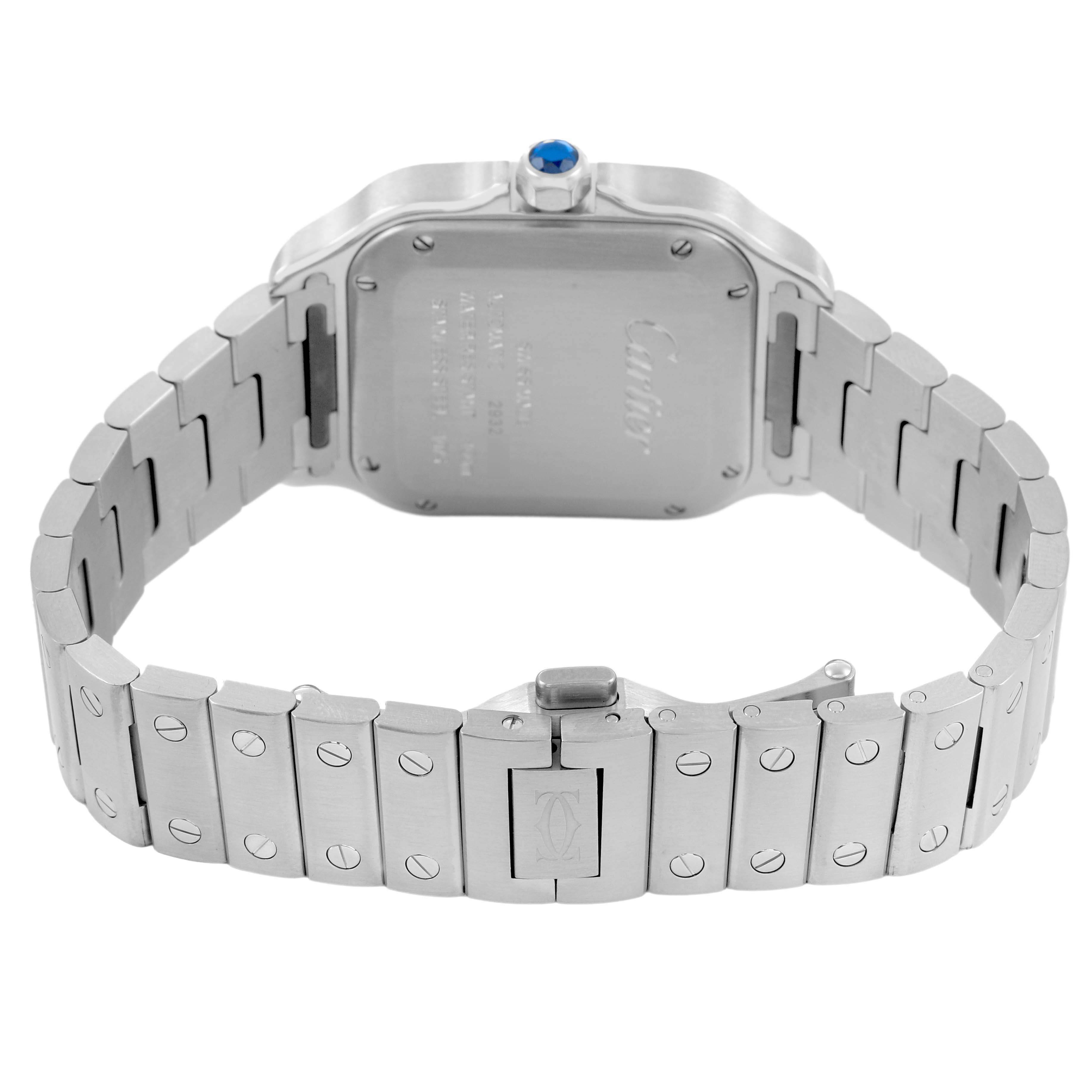 The image shows the back of the Cartier Santos WSSA0029 Men's Stainless Steel Silver Dial watch, highlighting the case back, bracelet links, and clasp from a rear angle.