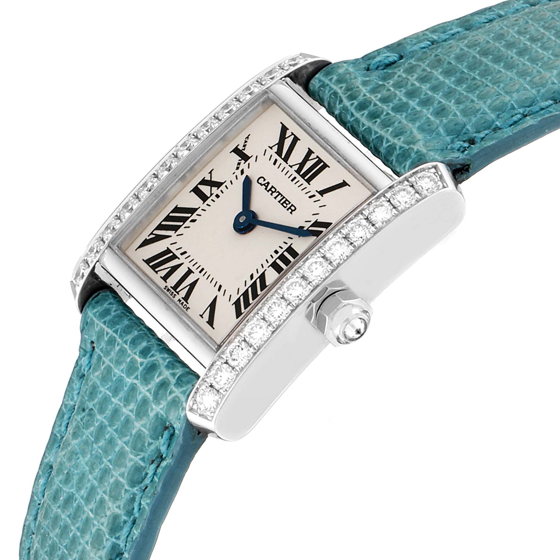 The Cartier Tank Francaise WE100231 Women
s White Gold Silver Dial WE100231 Women
s White Gold Silver Dial watch is shown at an angle emphasizing its face, bezel with diamonds, and part of the turquoise strap.