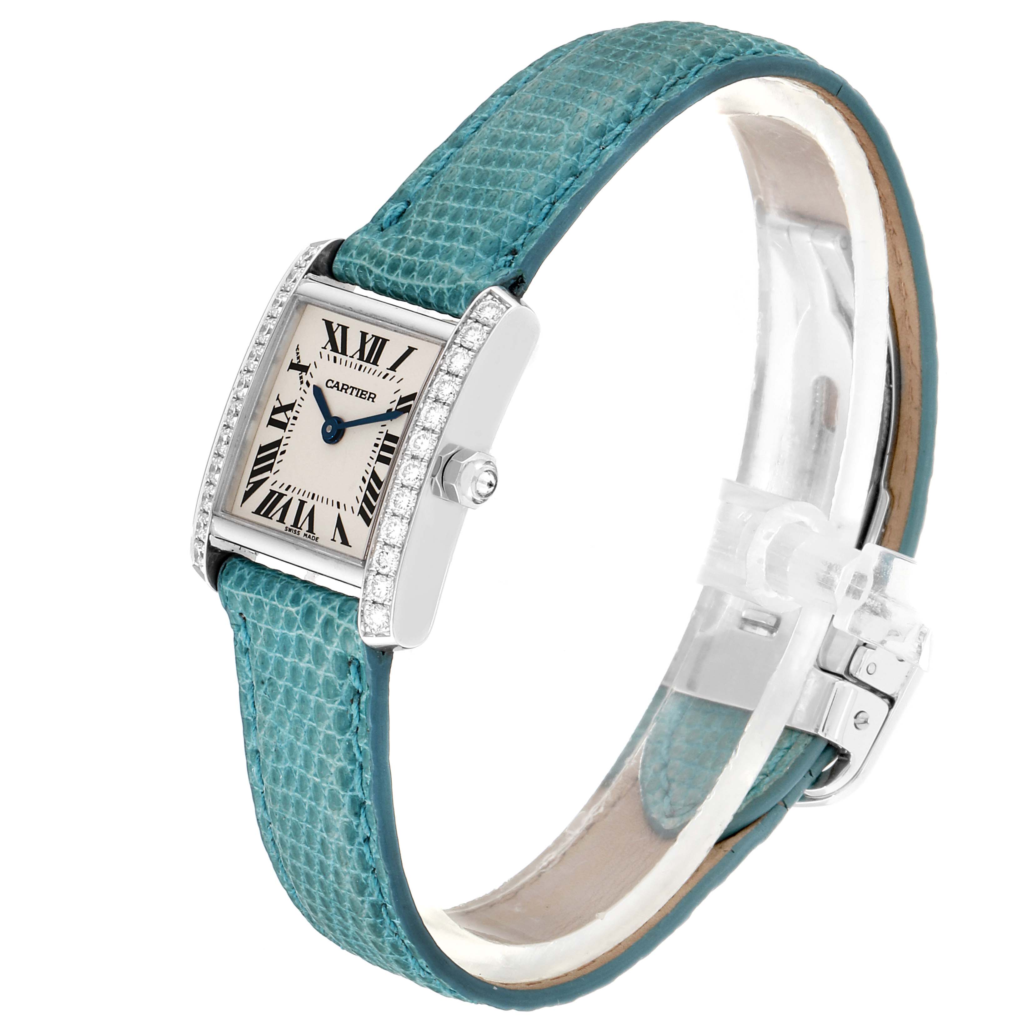 This image shows a side and angled view of the Cartier Tank Francaise WE100231 Women
s White Gold Silver Dial WE100231 Women
s White Gold Silver Dial watch with a turquoise strap and diamond accents.