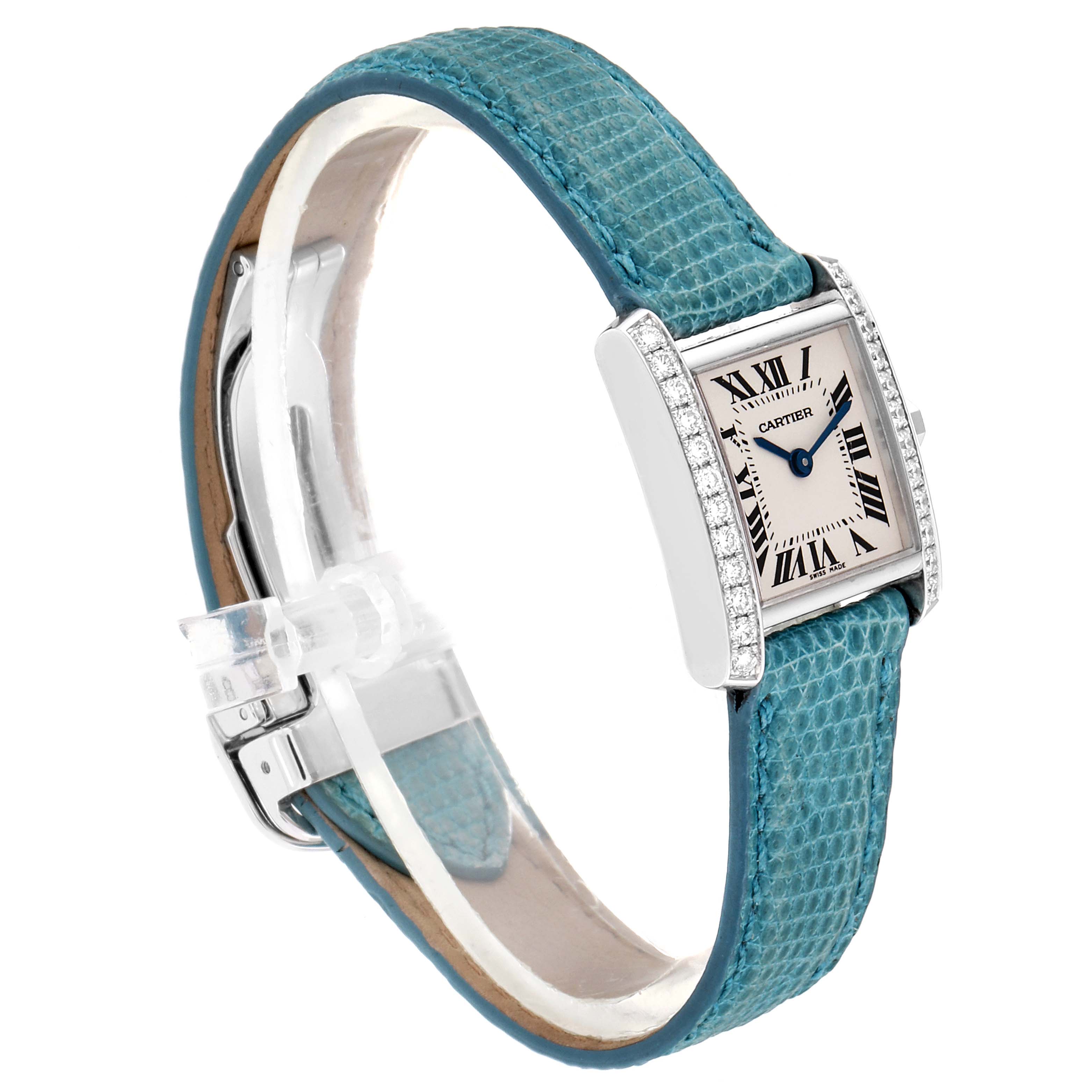 The Cartier Tank Francaise WE100231 Women
s White Gold Silver Dial WE100231 Women
s White Gold Silver Dial watch is shown at a side angle, displaying the face, strap, and buckle.