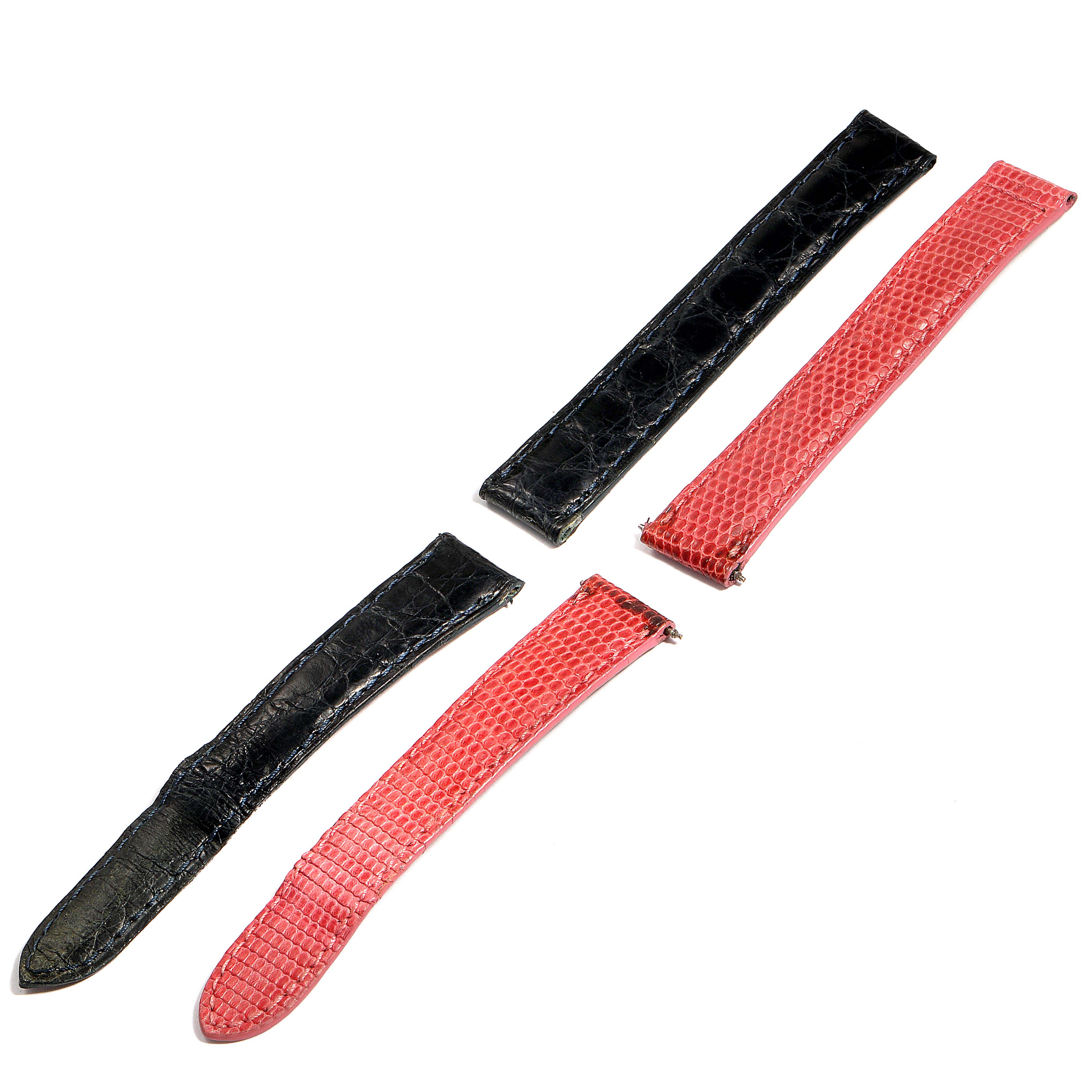 The image shows interchangeable black and red leather watch straps for the Cartier Tank Francaise WE100231 Women
s White Gold Silver Dial WE100231 Women
s White Gold Silver Dial model.