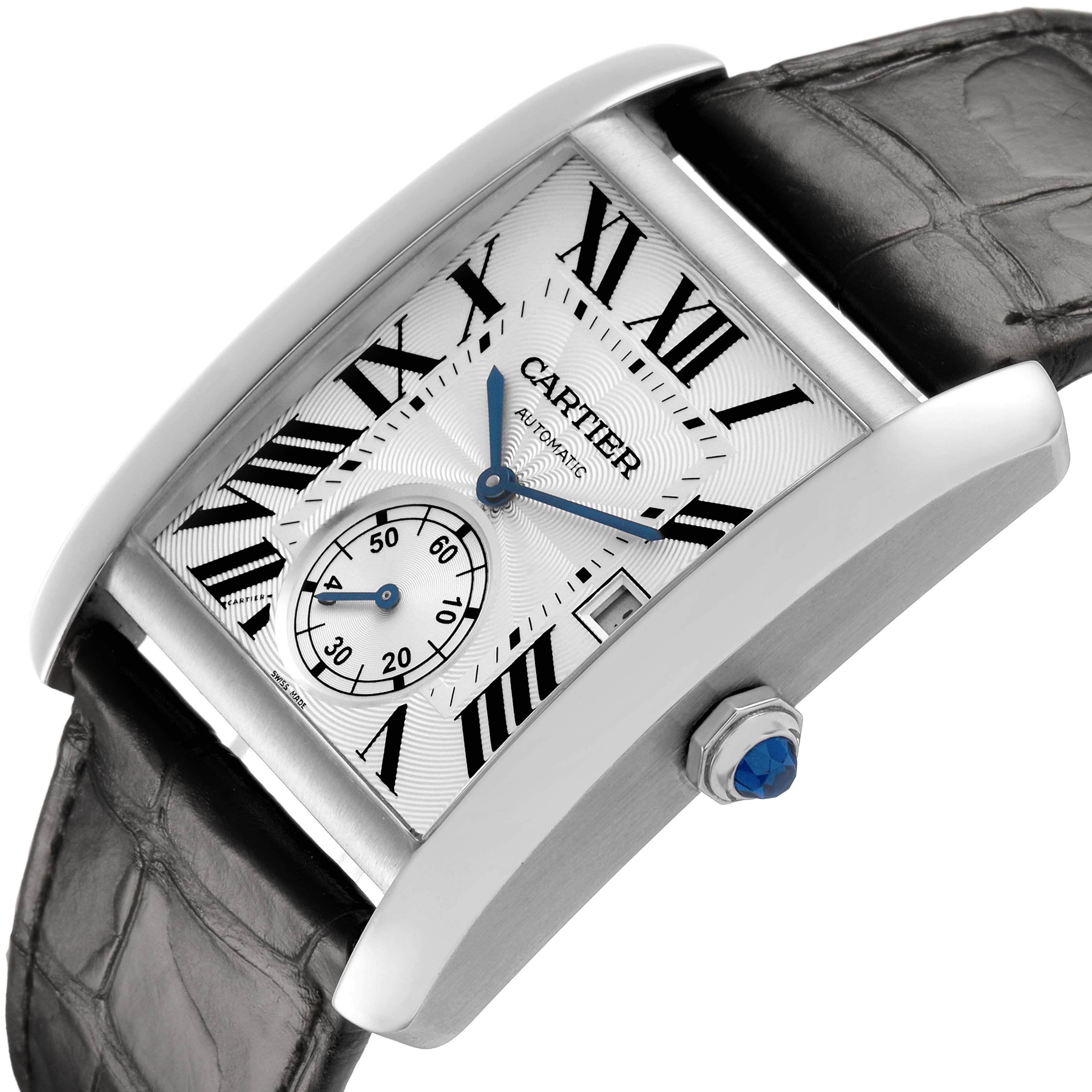 The Cartier Tank MC W5330003 Men's Stainless Steel Silver Dial watch is shown at an angled close-up, highlighting the Roman numerals, sub-dial, and blue sapphire crown.