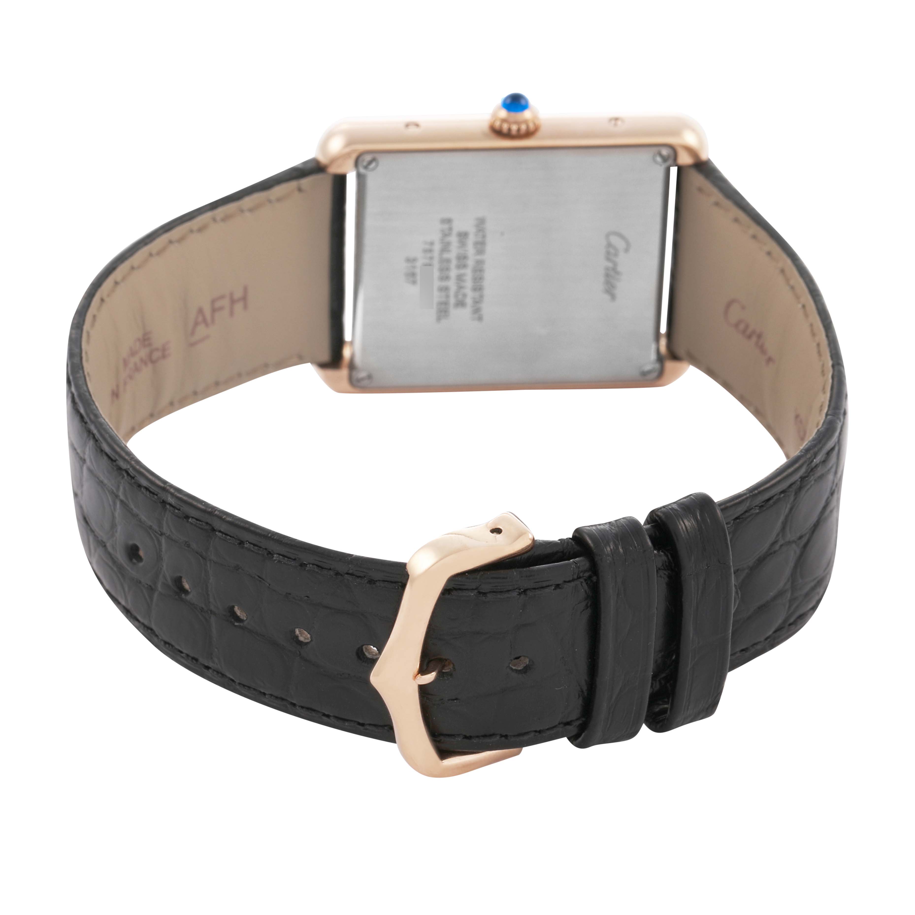 The image shows the Cartier Tank Solo W5200025 Men's Steel and Gold (two tone) Silver Dial watch from the back, highlighting the case back, crown, strap, and buckle.
