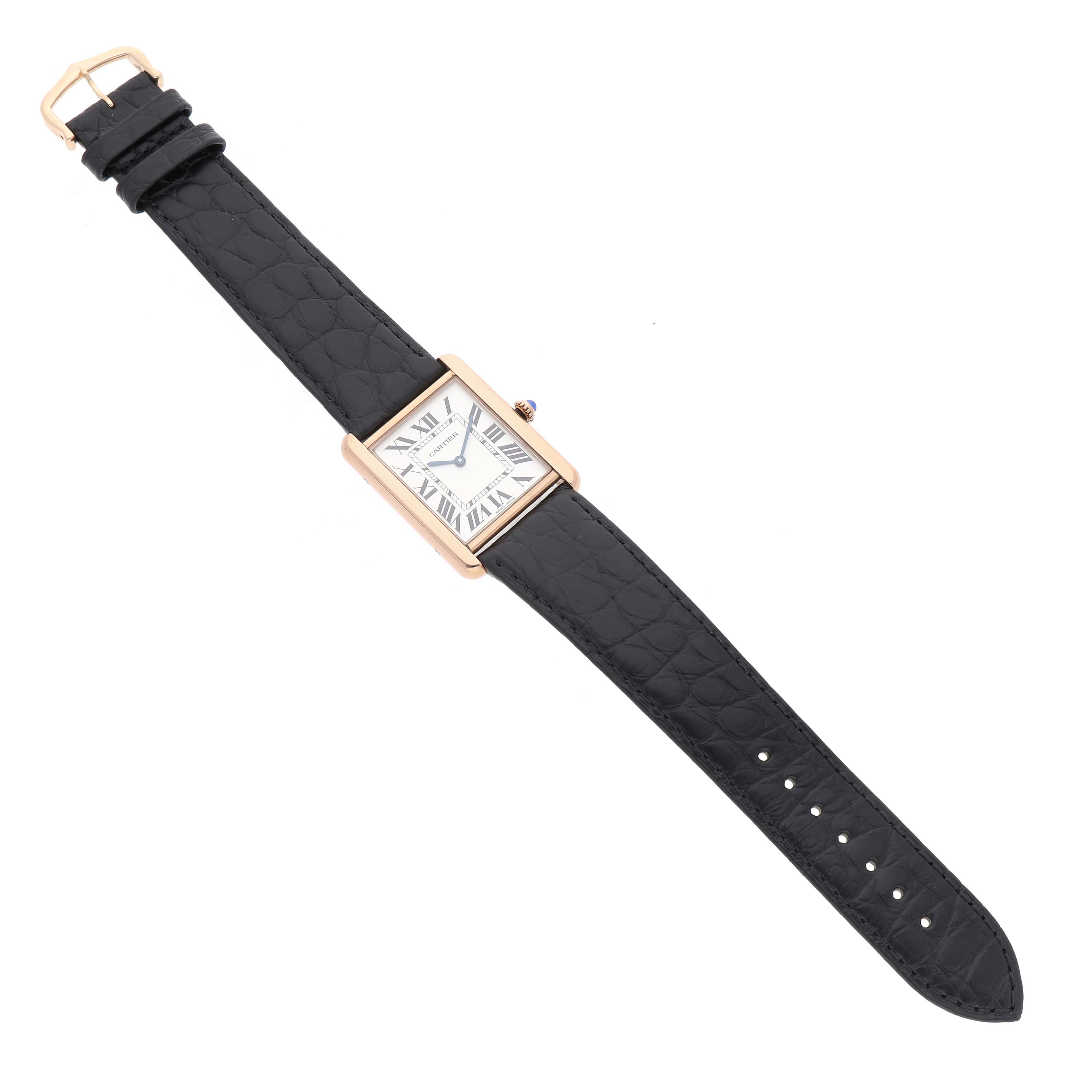 The Cartier Tank Solo W5200025 Men's Steel and Gold (two tone) Silver Dial watch is shown from a top-down angle, displaying the rectangular face and black leather strap fully extended.