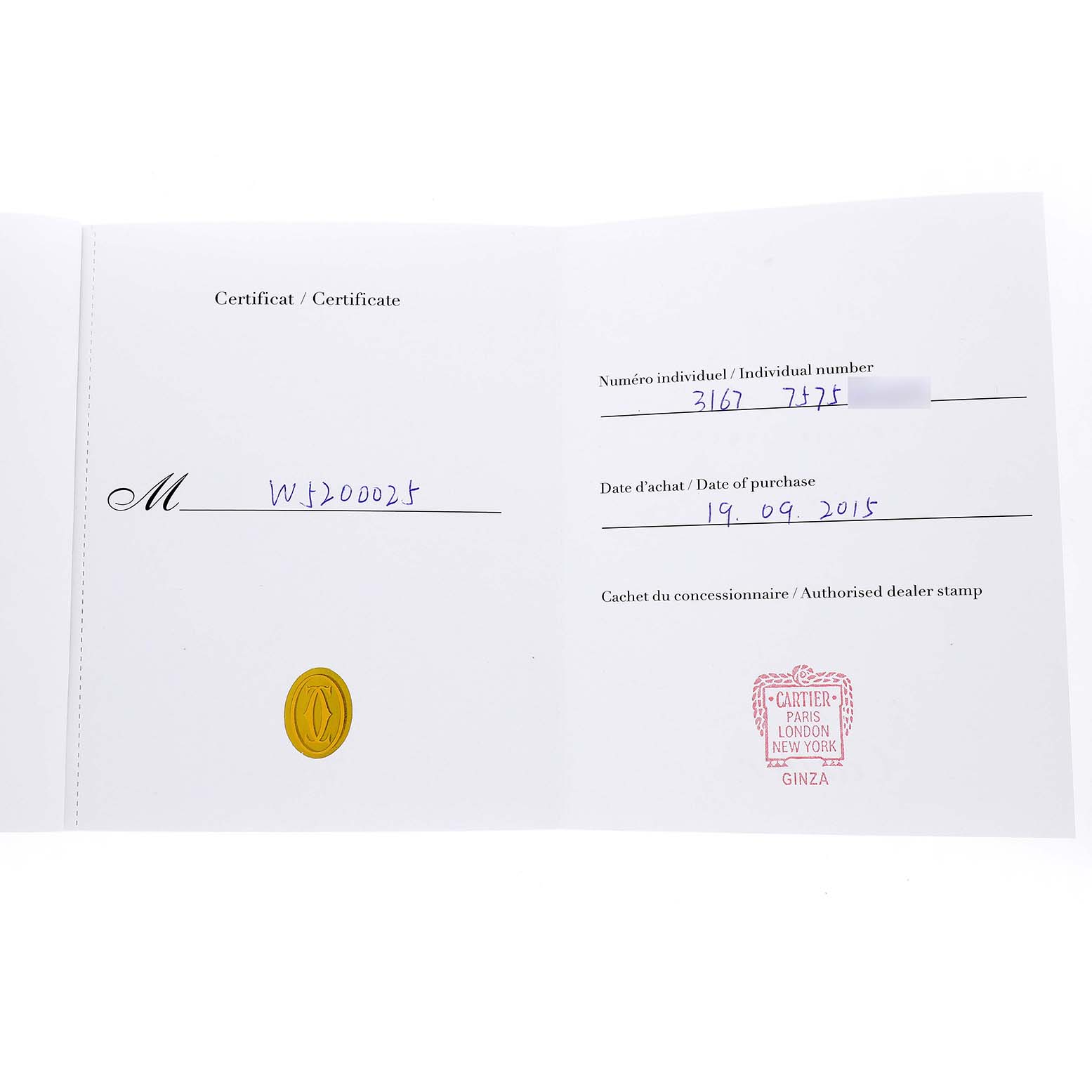 The image shows an open certificate for a Cartier Tank Solo W5200025 Men's Steel and Gold (two tone) Silver Dial watch, displaying purchase details and dealer stamp.