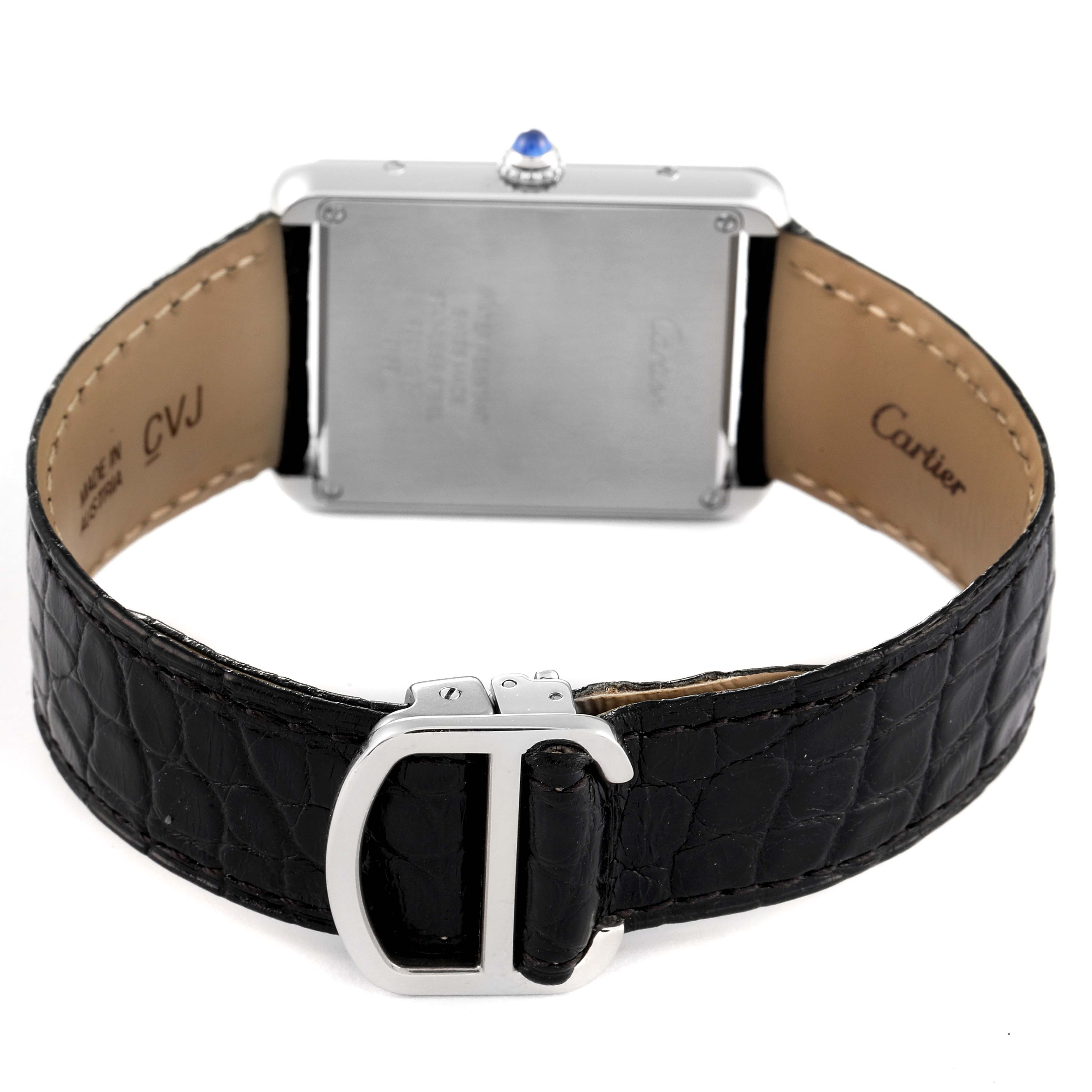 This image shows the back view of a Cartier Tank Solo W1018355 Men's Stainless Steel Silver Dial W1018355 Men's Stainless Steel Silver Dial watch, highlighting its rectangular case, black leather strap, and silver buckle clasp.