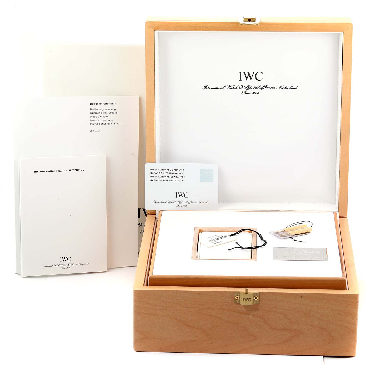 The image displays the boxed packaging, documentation, and accessories for an IWC Pilot IW371319 Men's Stainless Steel Black Dial IW371319 Men's Stainless Steel Black Dial model watch.