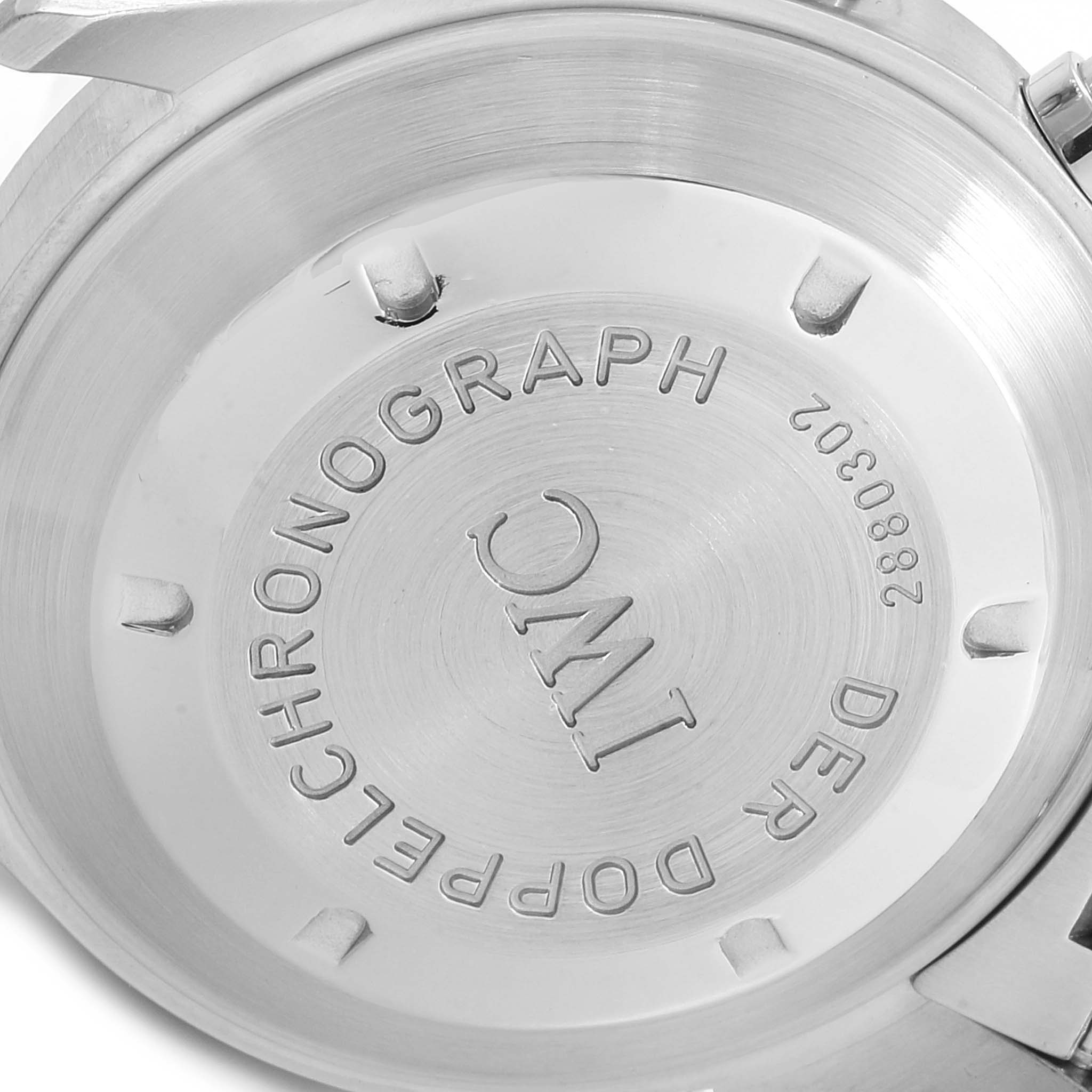 This is a close-up view of the back case of the IWC Pilot IW371319 Men's Stainless Steel Black Dial IW371319 Men's Stainless Steel Black Dial model watch, showing branded engravings and serial number.