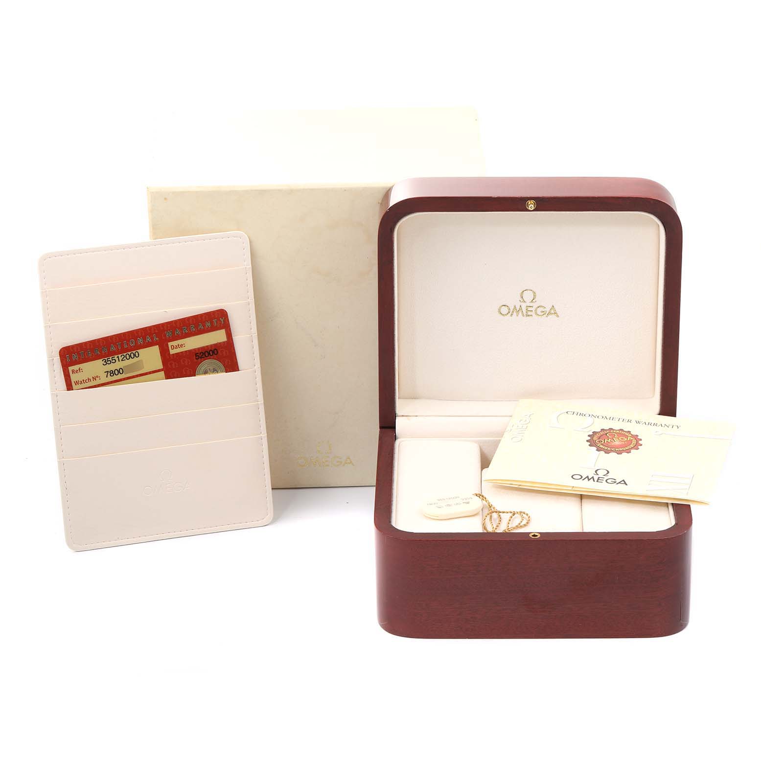 The image shows the Omega Speedmaster 3551.20.00 Men's Stainless Steel White Dial 3551.20.00 Men's Stainless Steel White Dial packaging, including a watch box, warranty cards, booklet, and outer box.