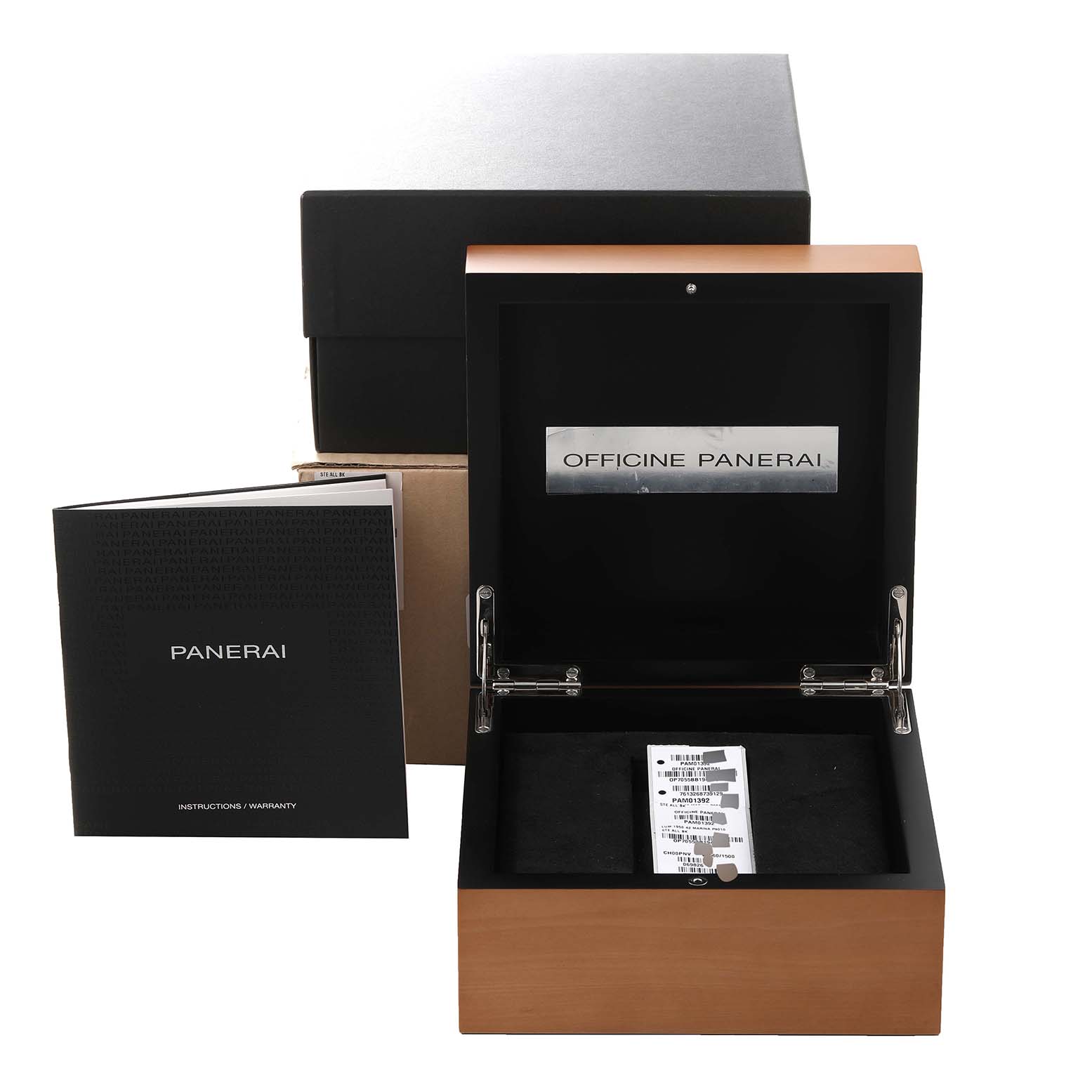 The image shows the packaging and accessories for a Panerai Luminor PAM01392 Men
s Stainless Steel Black Dial PAM01392 Men
s Stainless Steel Black Dial watch, including the watch box and instruction manual.