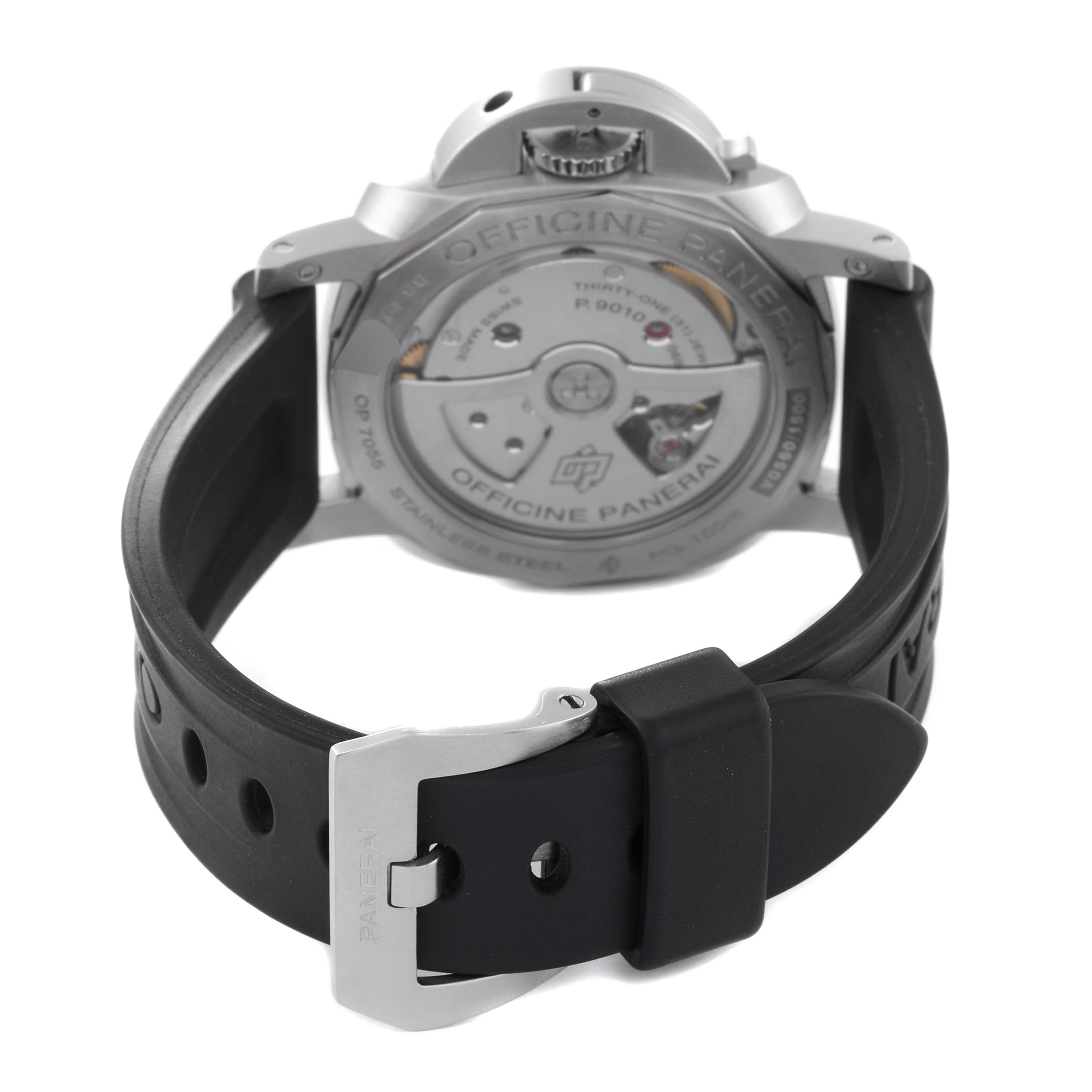 The image shows the backside of a Panerai Luminor PAM01392 Men
s Stainless Steel Black Dial PAM01392 Men
s Stainless Steel Black Dial watch, highlighting the movement and black rubber strap with the buckle.