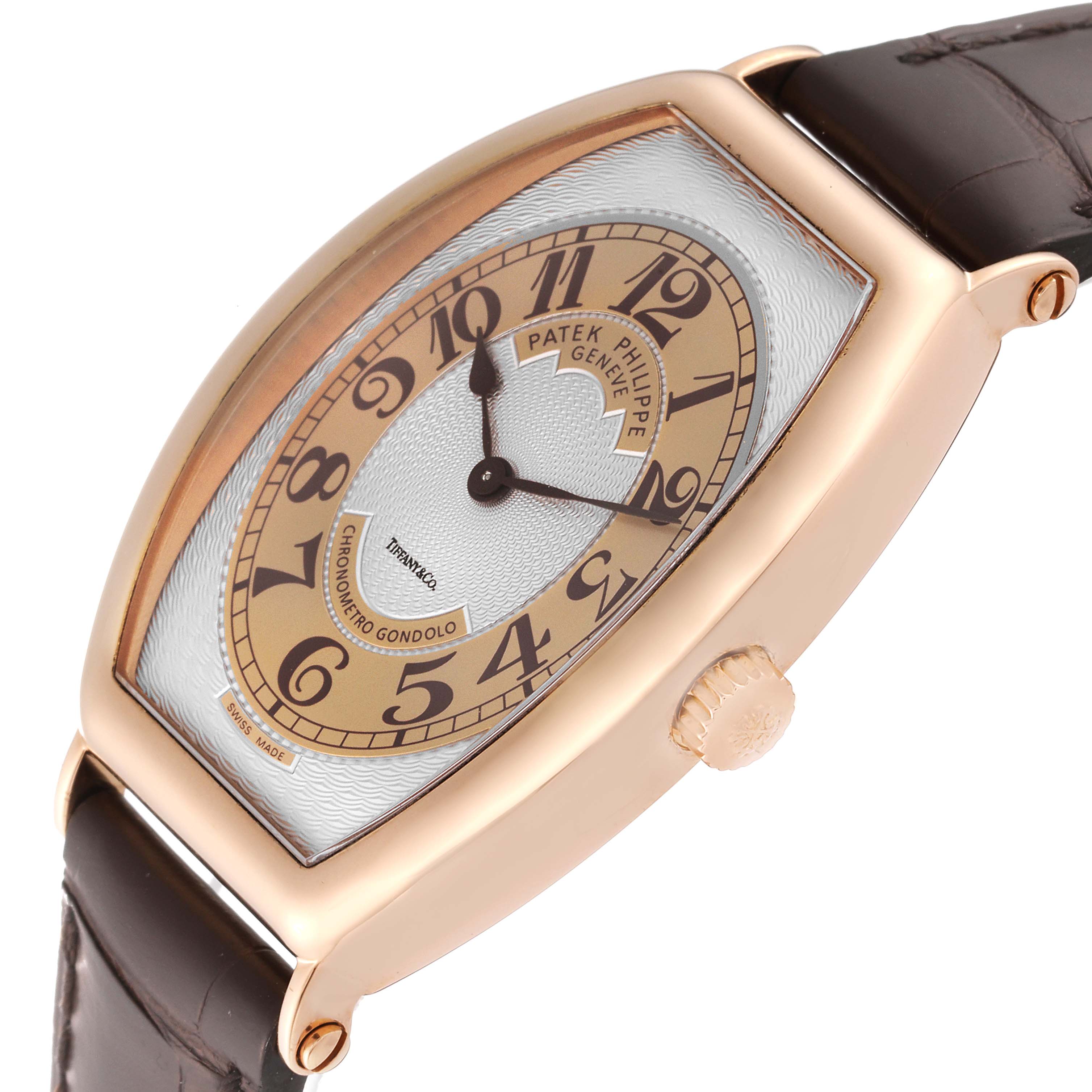The image shows a side view of a Patek Philippe Gondolo 5098R-001 Men's Rose Gold Silver Dial 5098R-001 Men's Rose Gold Silver Dial watch, highlighting the face, crown, and brown leather strap.