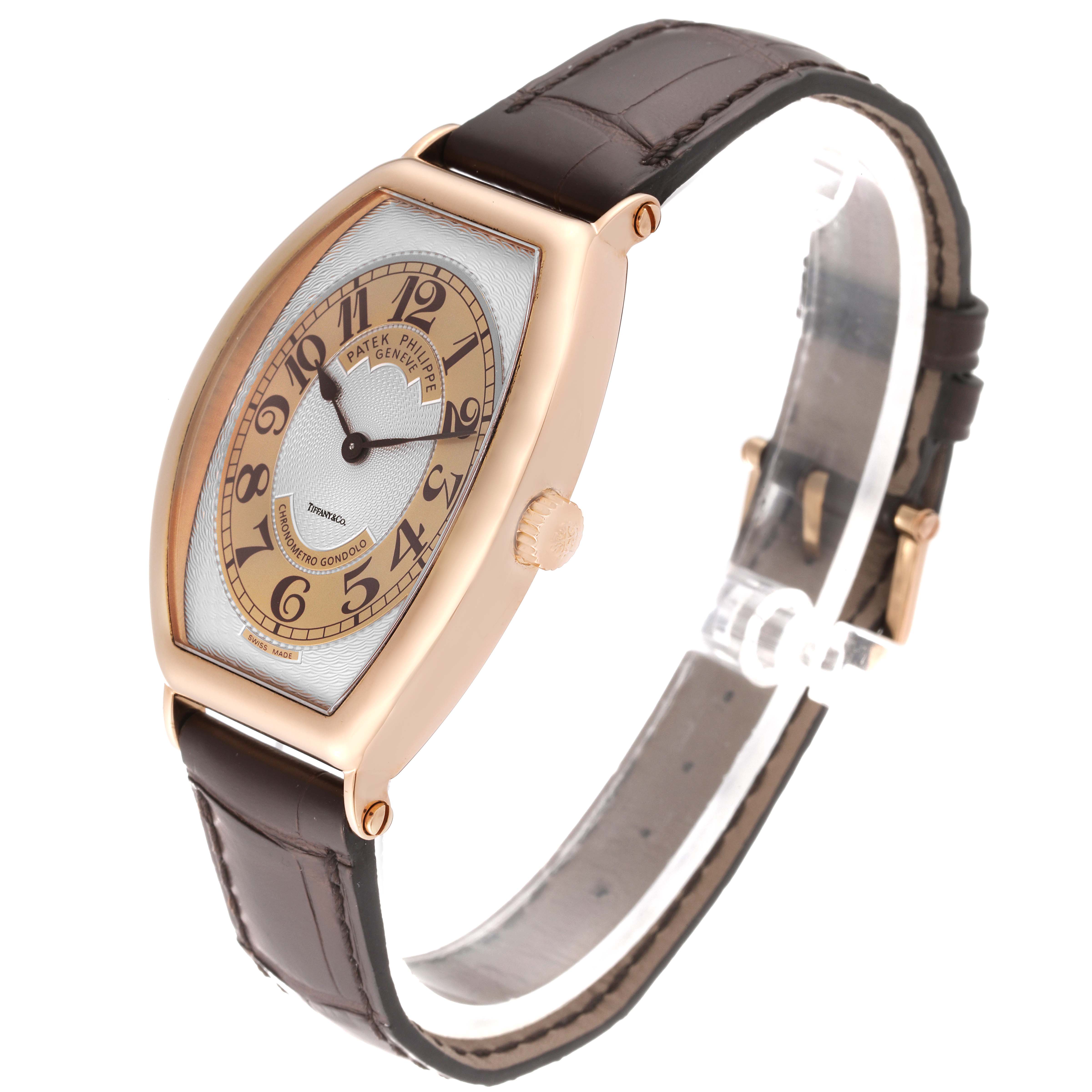 This image shows a side and angled view of the Patek Philippe Gondolo 5098R-001 Men's Rose Gold Silver Dial 5098R-001 Men's Rose Gold Silver Dial watch, featuring its case, dial, crown, and strap.
