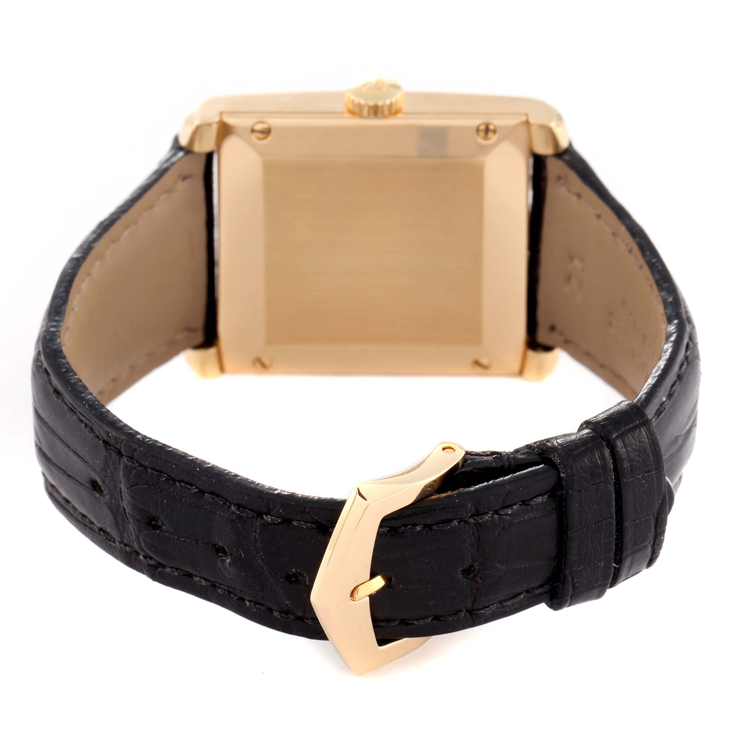 This image shows the back view of a Patek Philippe Gondolo 5014J Men's Yellow Gold Black Dial 5014J Men's Yellow Gold Black Dial watch, featuring its gold case and leather strap with a gold buckle.