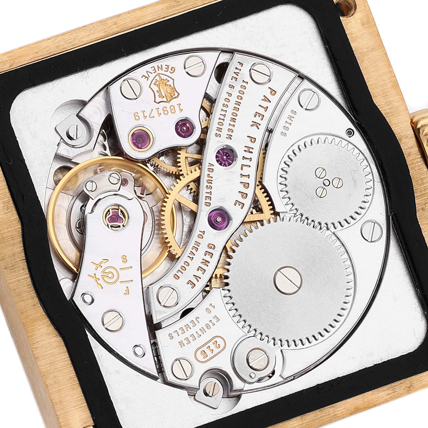 The image shows the internal mechanism of a Patek Philippe Gondolo 5014J Men's Yellow Gold Black Dial 5014J Men's Yellow Gold Black Dial watch from a close-up angle.