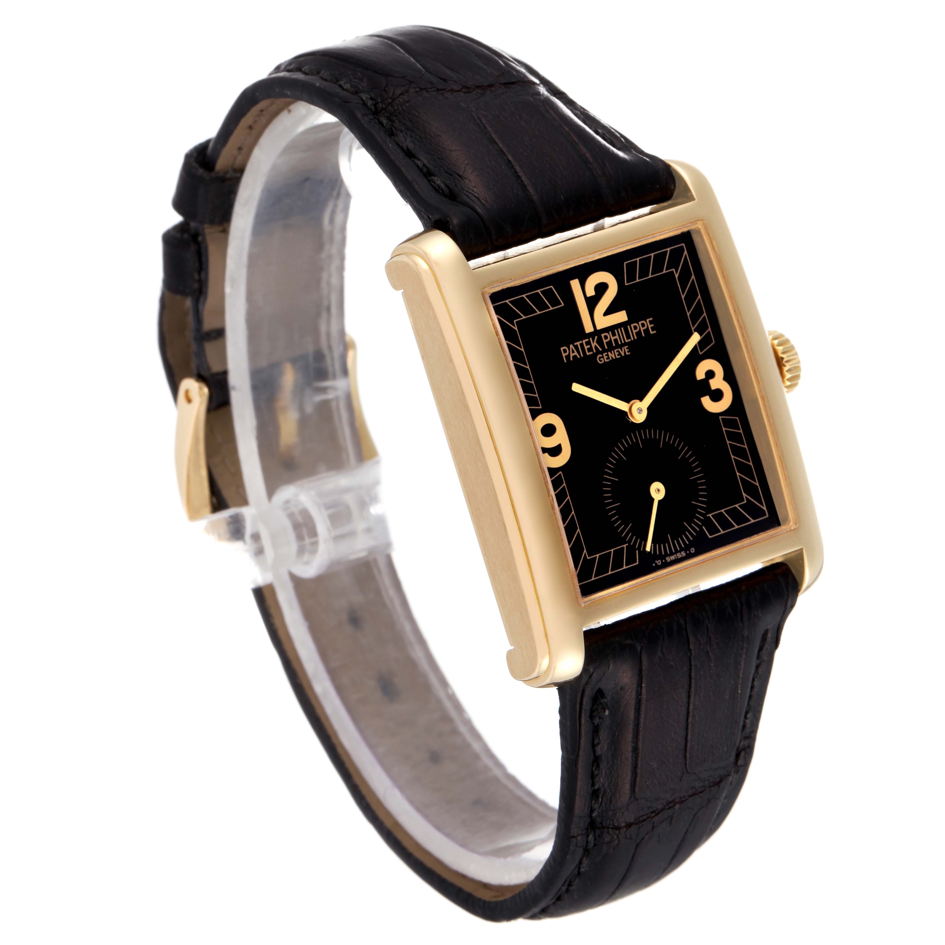 The image shows a Patek Philippe Gondolo 5014J Men's Yellow Gold Black Dial 5014J Men's Yellow Gold Black Dial model watch from an angled front view, highlighting its black dial, leather strap, and gold case.