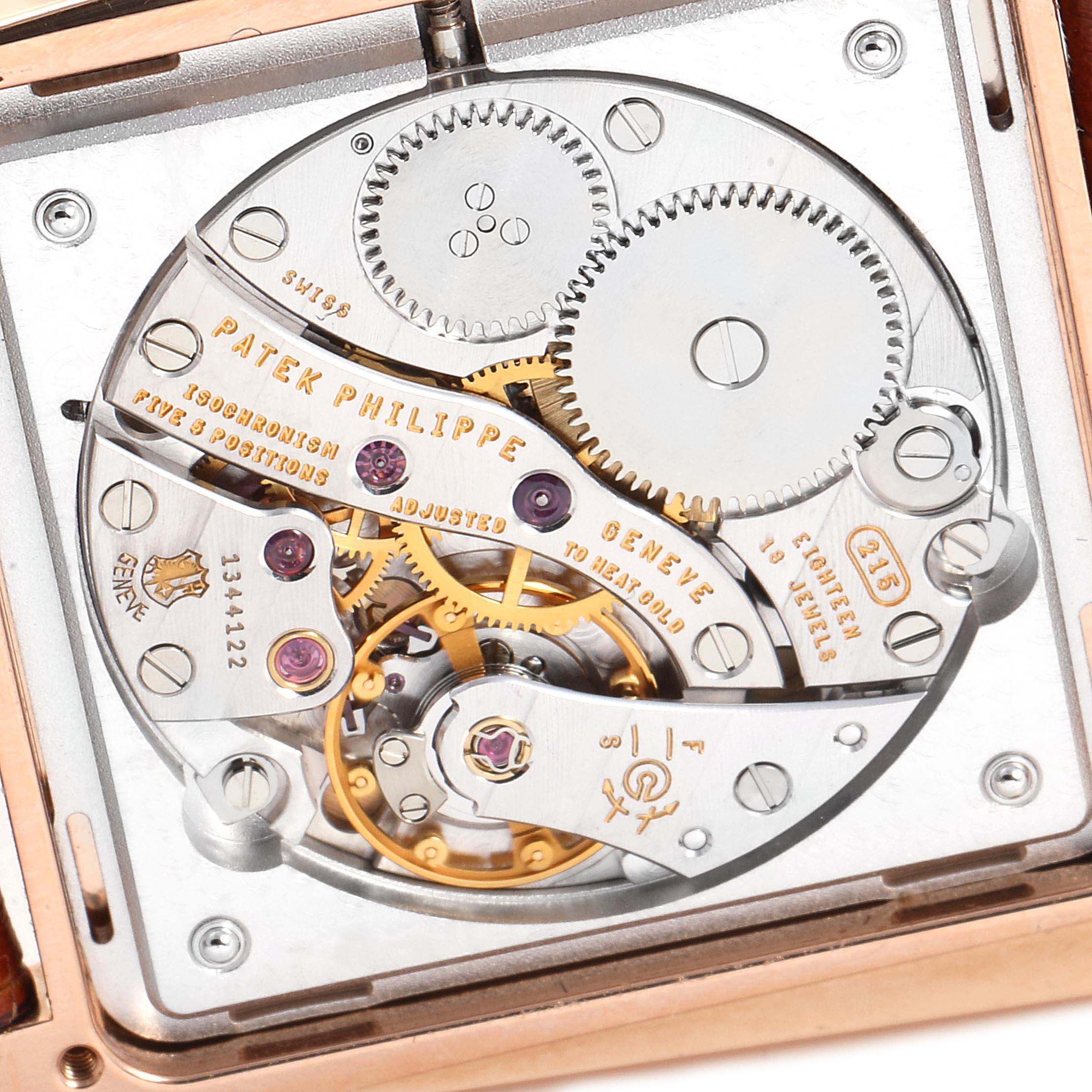 The image displays the detailed internal mechanics of the Patek Philippe Gondolo 5489R Men's Rose Gold Silver Dial 5489R Men's Rose Gold Silver Dial watch, emphasizing its movement components.