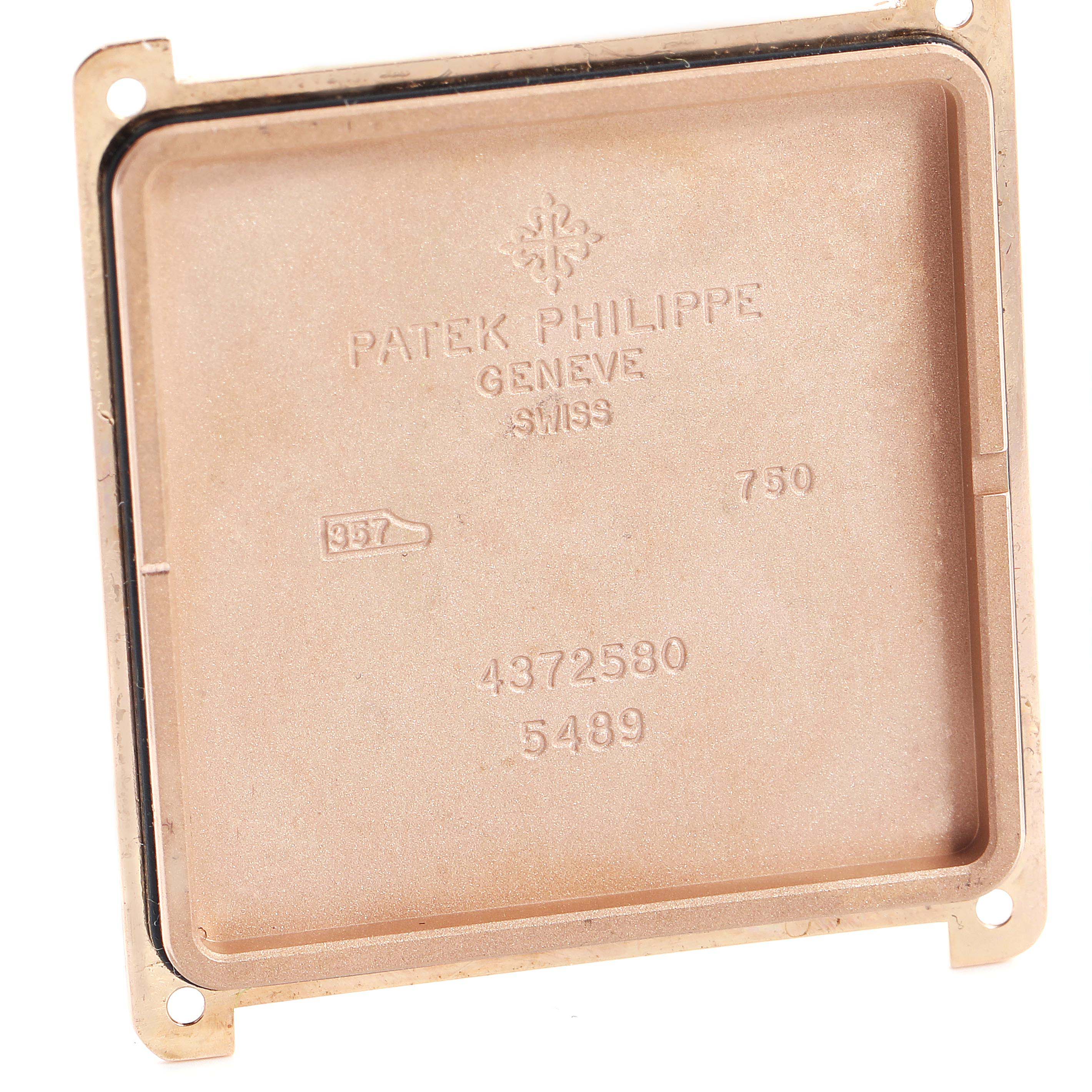 This image shows the back casing of a Patek Philippe Gondolo 5489R Men's Rose Gold Silver Dial 5489R Men's Rose Gold Silver Dial watch, viewed from the inside.