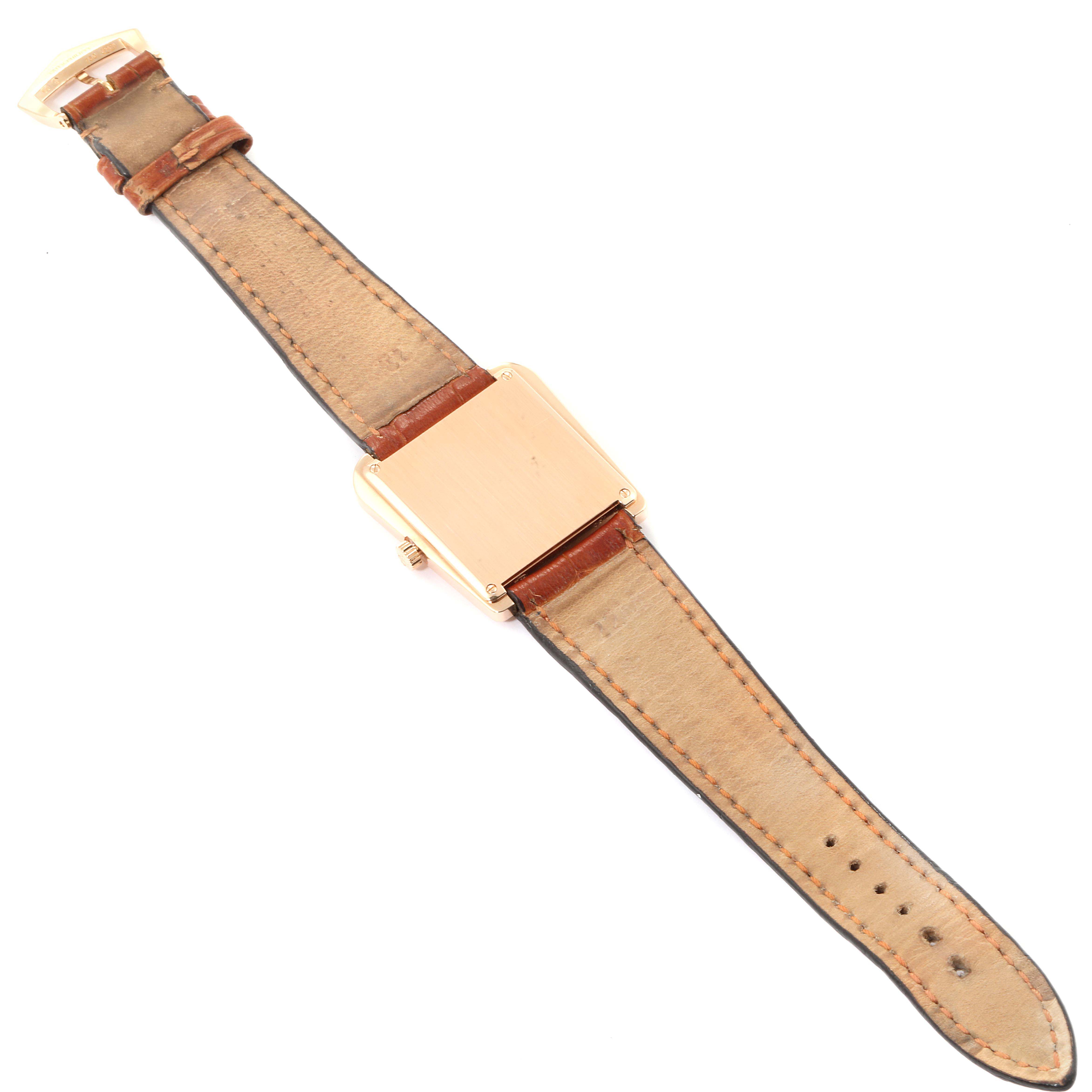 The image shows the back view of a Gondolo model watch by Patek Philippe, including the strap and buckle.