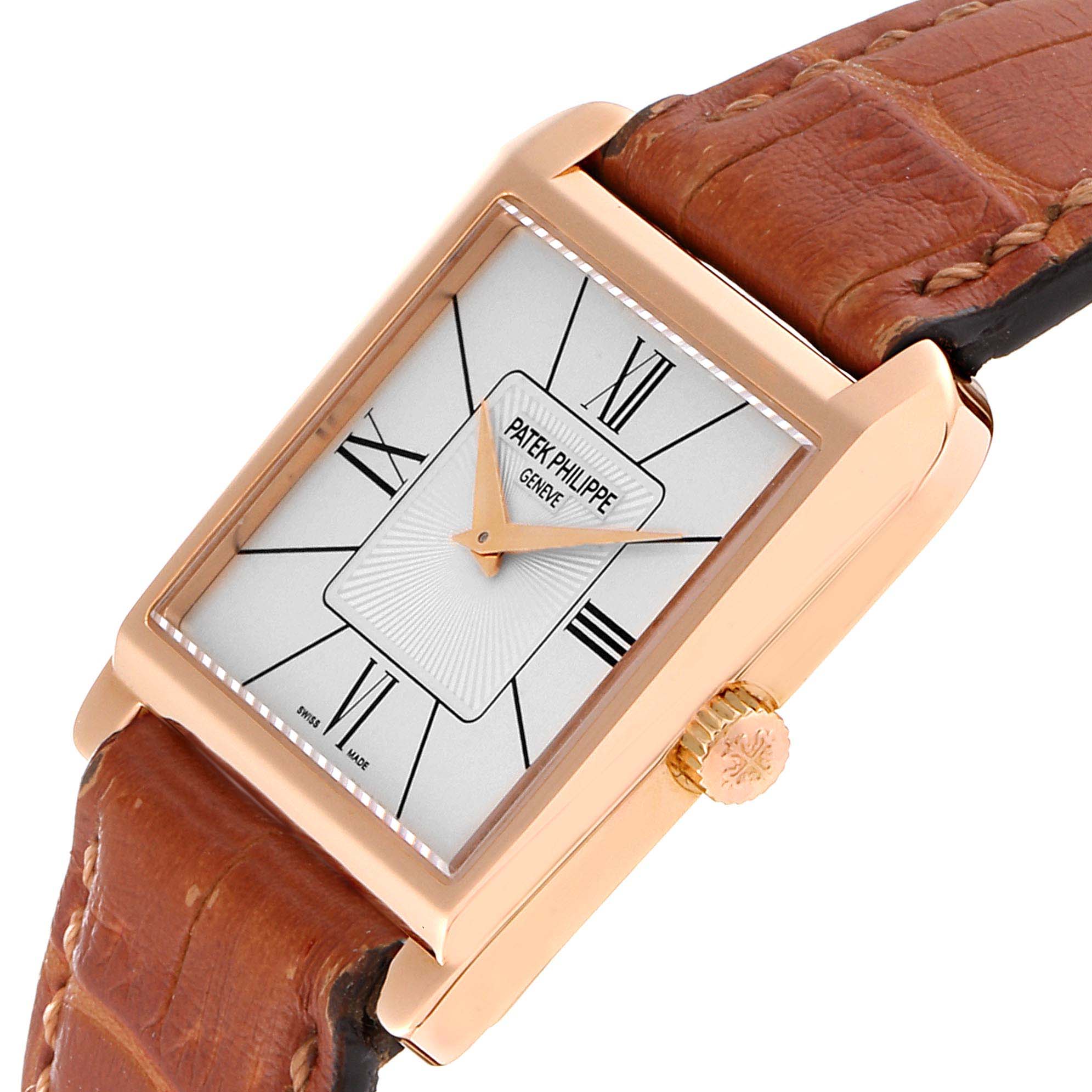 The image shows a close-up, angled view of the Patek Philippe Gondolo 5489R Men's Rose Gold Silver Dial 5489R Men's Rose Gold Silver Dial watch, displaying its face, crown, and leather strap.