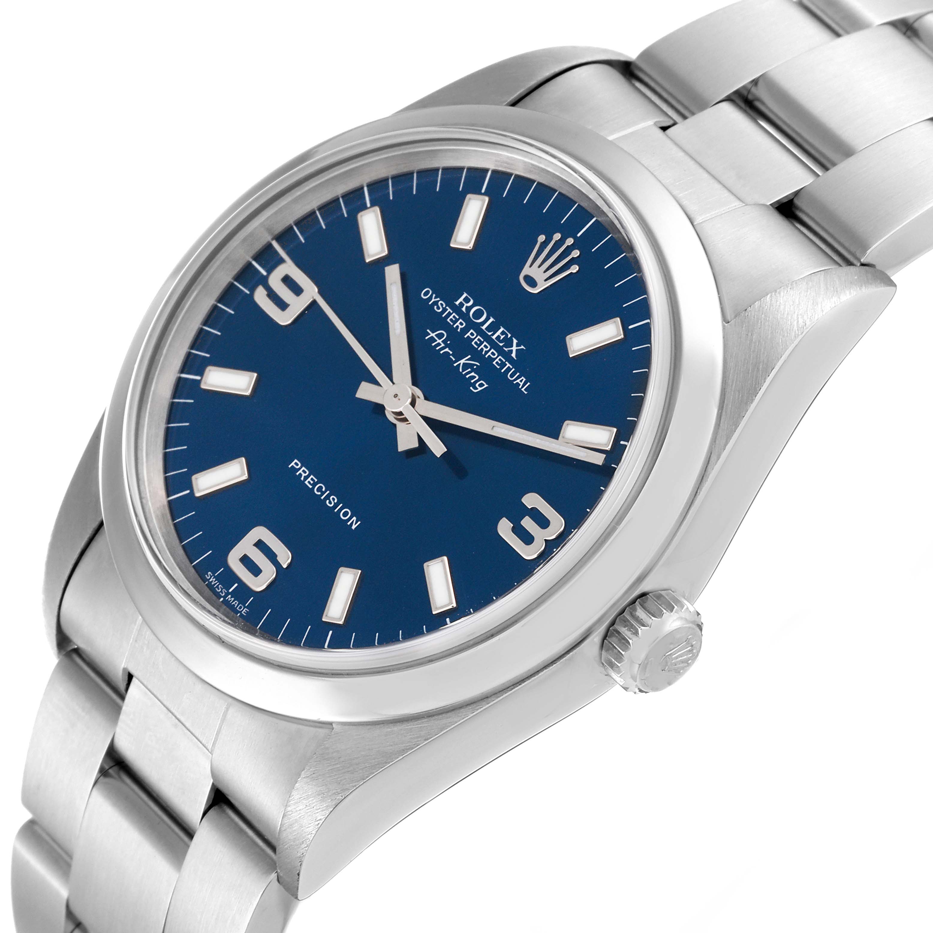 The image shows a close-up of the Rolex Air-King 14000 Men's Stainless Steel Blue Dial 14000 Men's Stainless Steel Blue Dial watch, highlighting the blue dial, silver bracelet, and crown from a tilted angle.