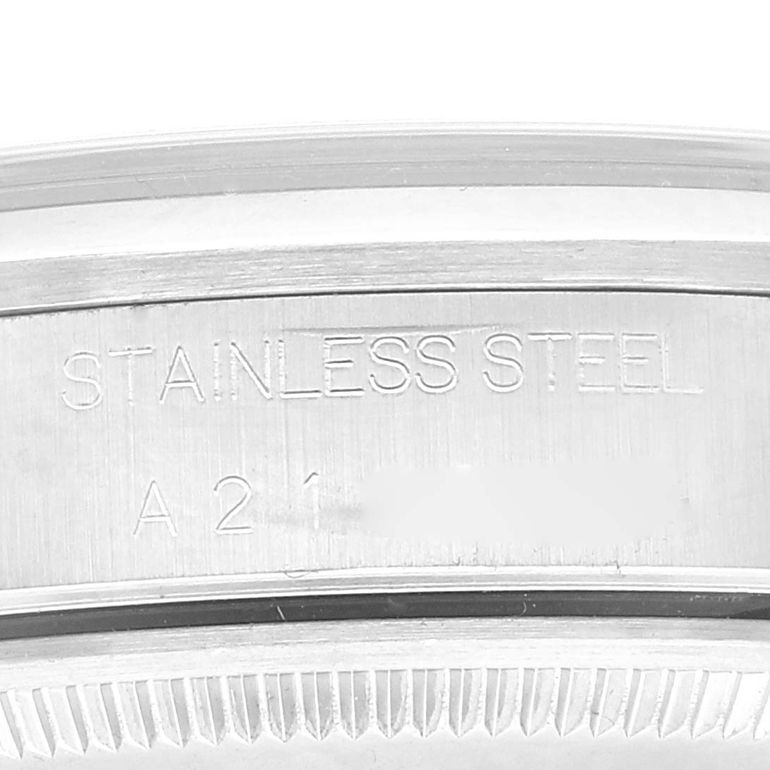 The image shows a close-up of the stainless steel back case of a Rolex Air-King 14000 Men's Stainless Steel Blue Dial 14000 Men's Stainless Steel Blue Dial watch.