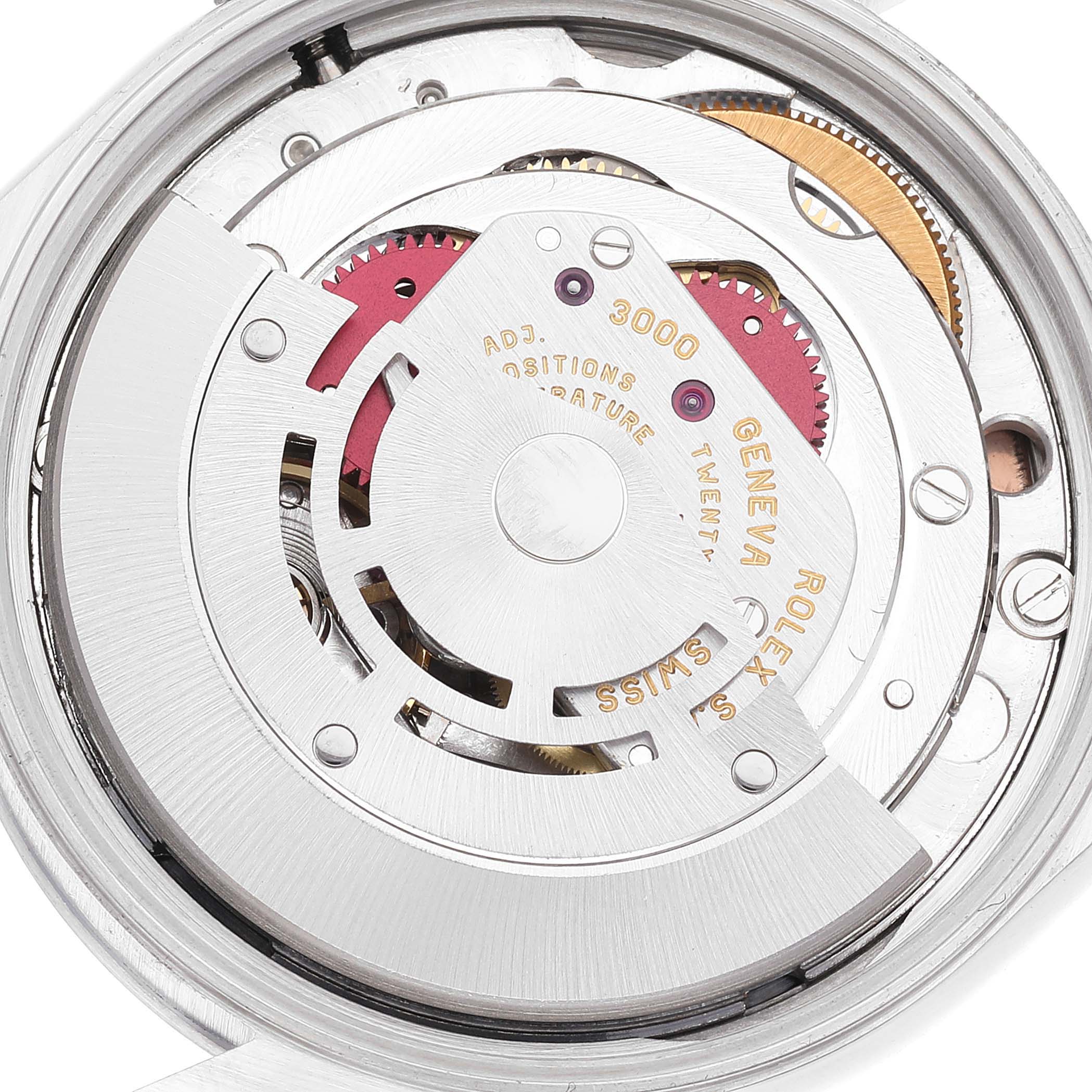 The image shows an internal view of the Rolex Air-King 14000 Men's Stainless Steel Pink Dial 14000 Men's Stainless Steel Pink Dial watch, highlighting its intricate movement mechanism.