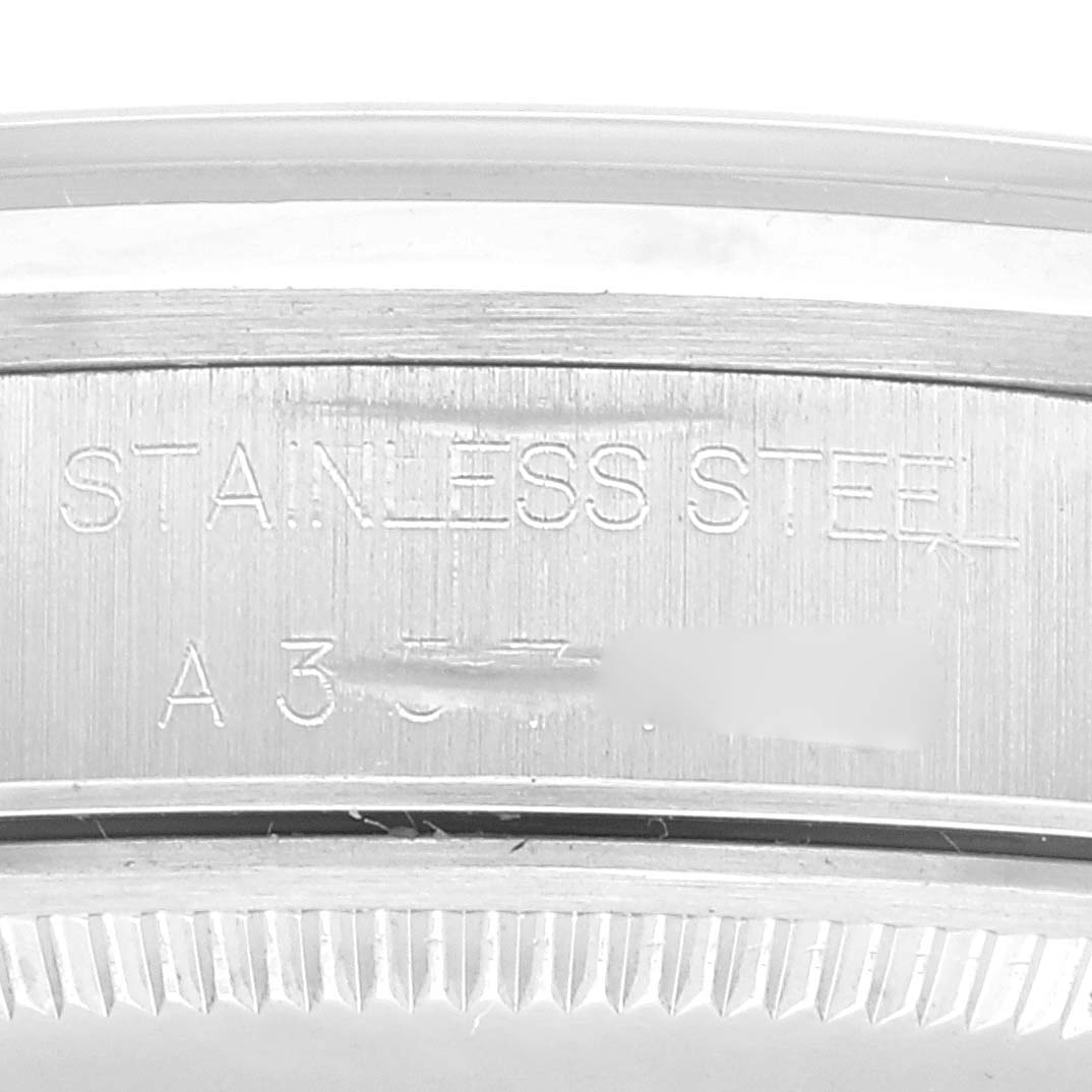 The image shows a close-up of the side engraving on a stainless steel Rolex Air-King 14000 Men's Stainless Steel Pink Dial 14000 Men's Stainless Steel Pink Dial watch case.